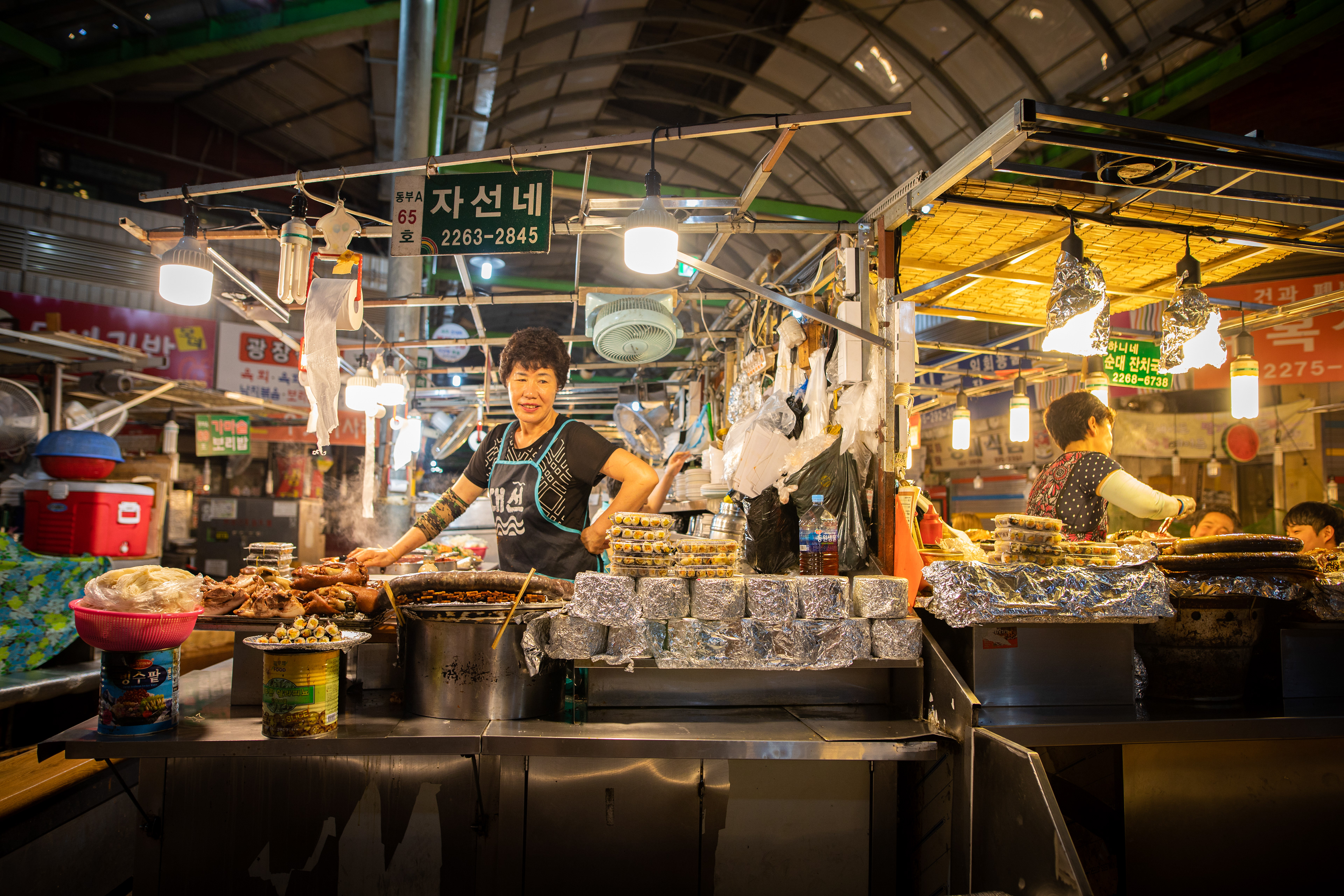 Food stalls and cooking equipment in a covered market