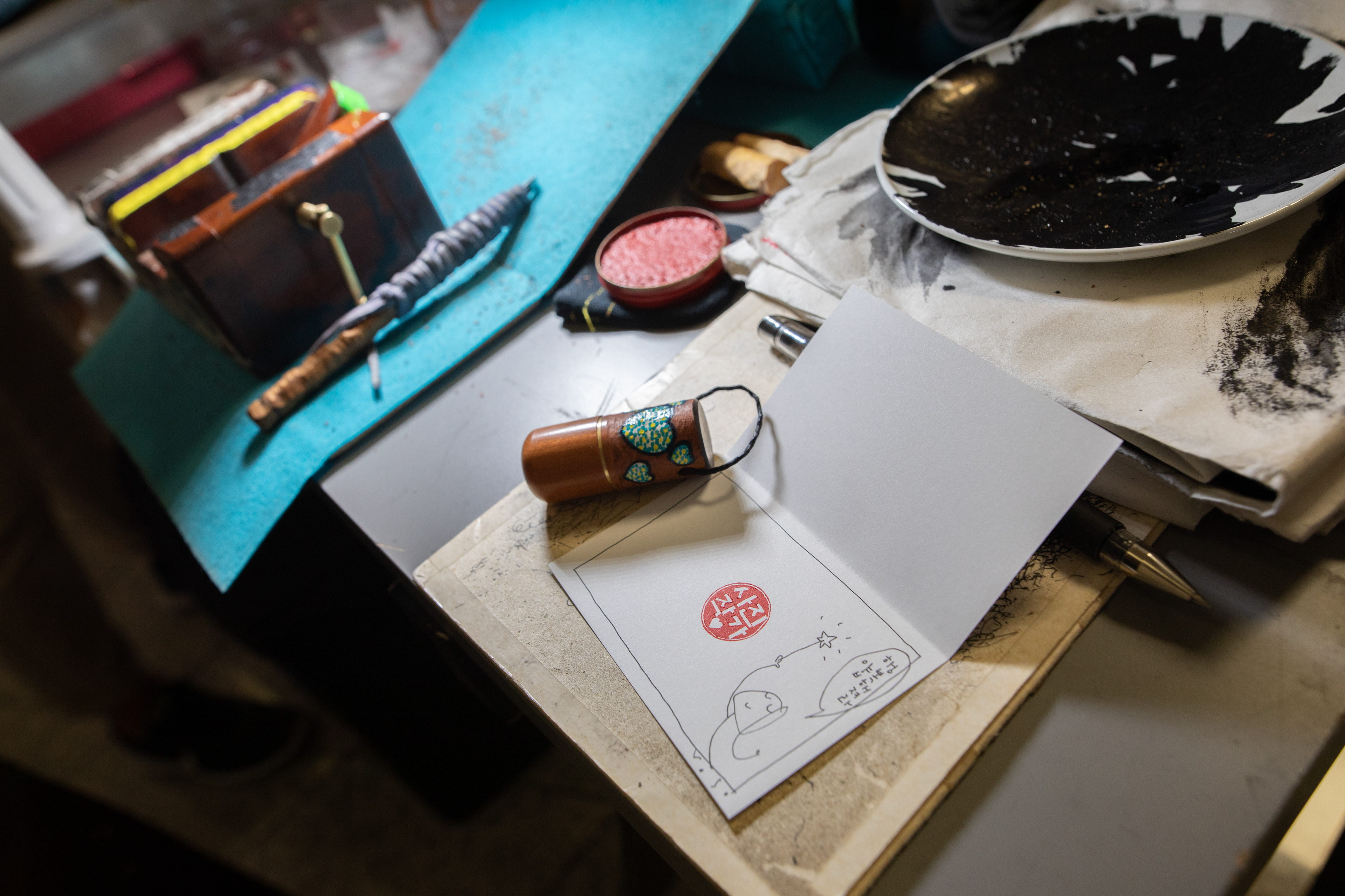 Art tools and materials on a workbench in South Korea