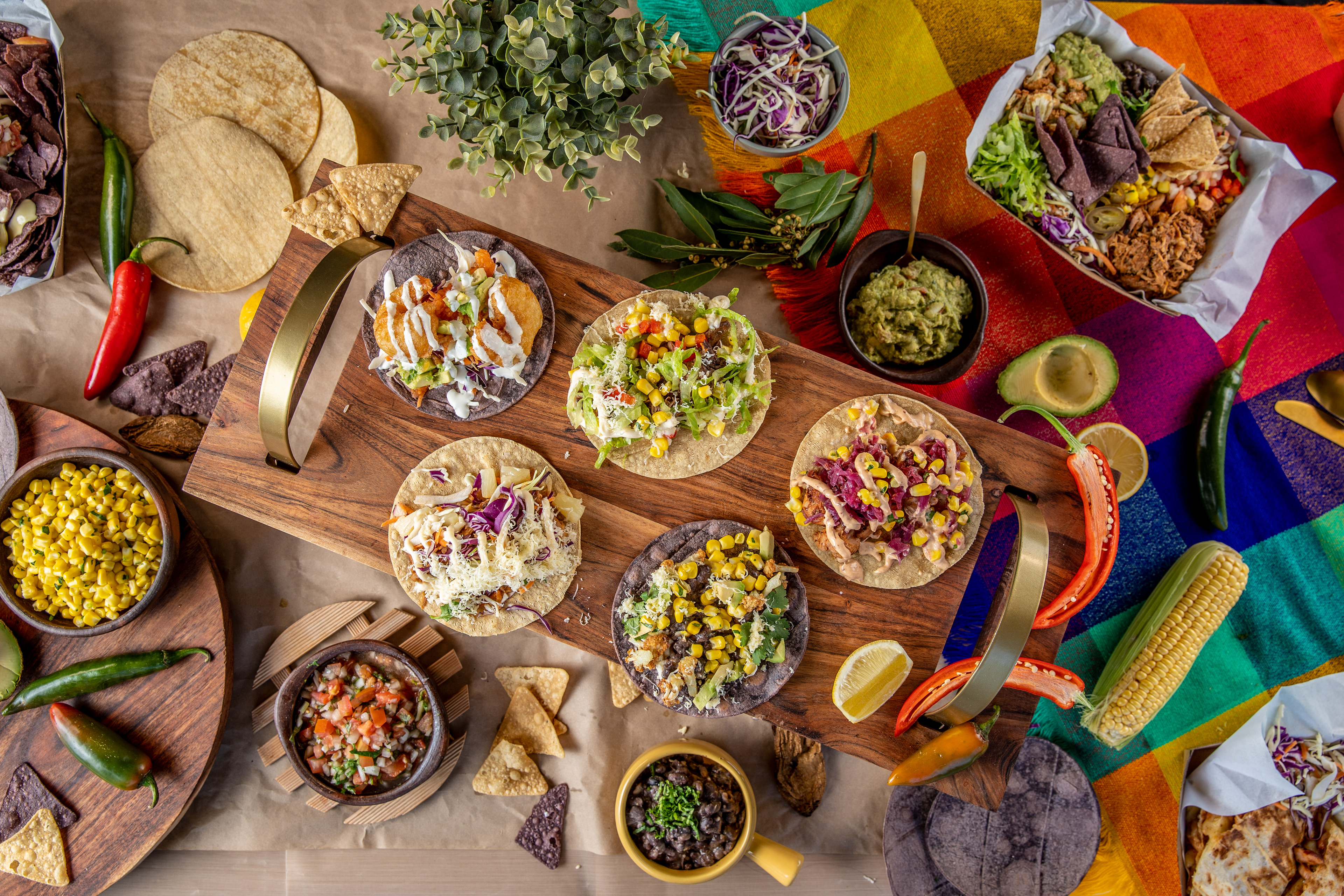 Shared table of curries, rice and flatbreads