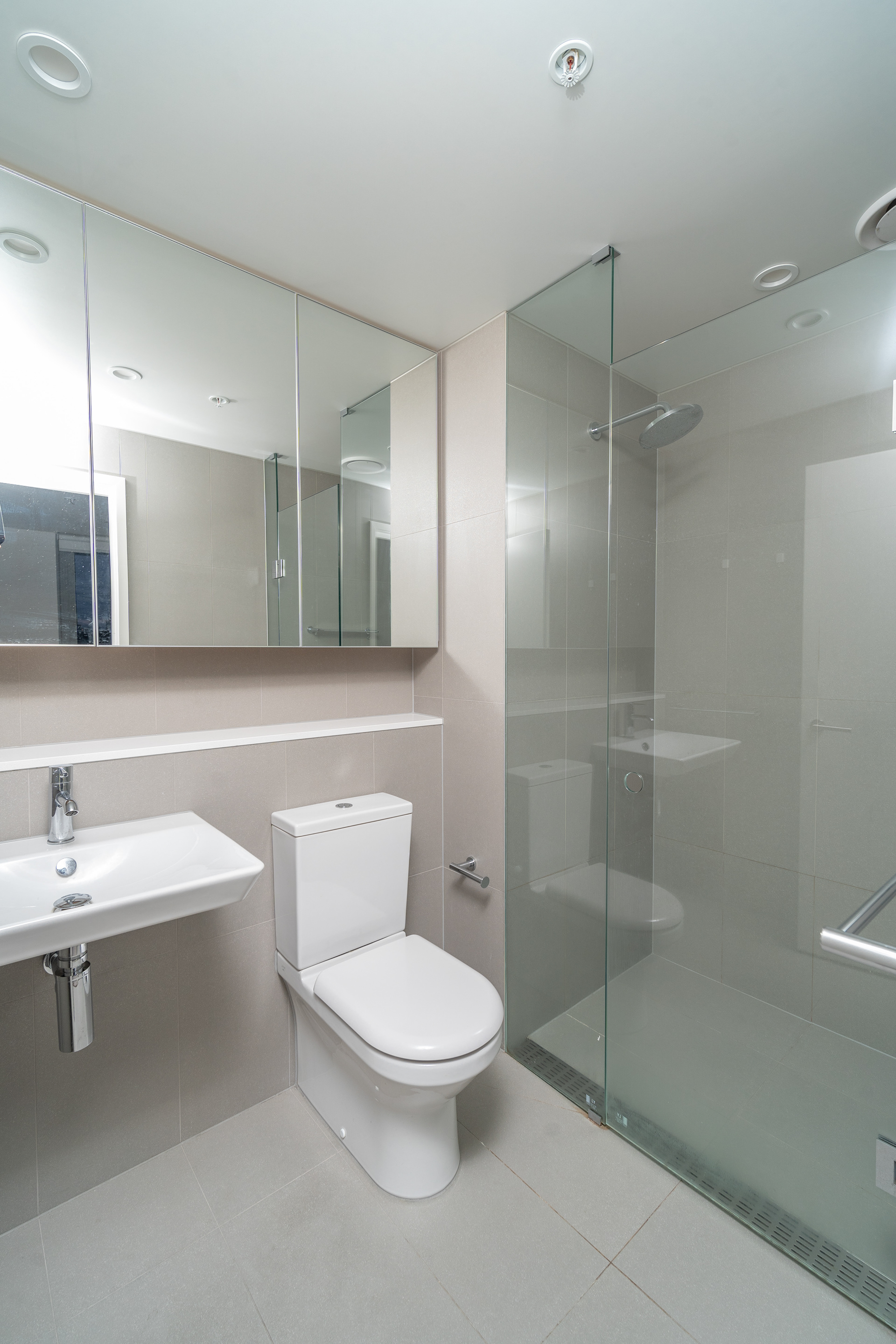 Interior passage with white cabinetry