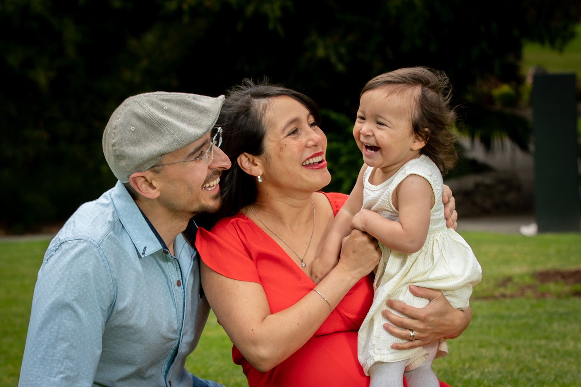 Child hugging a parent during a family portrait