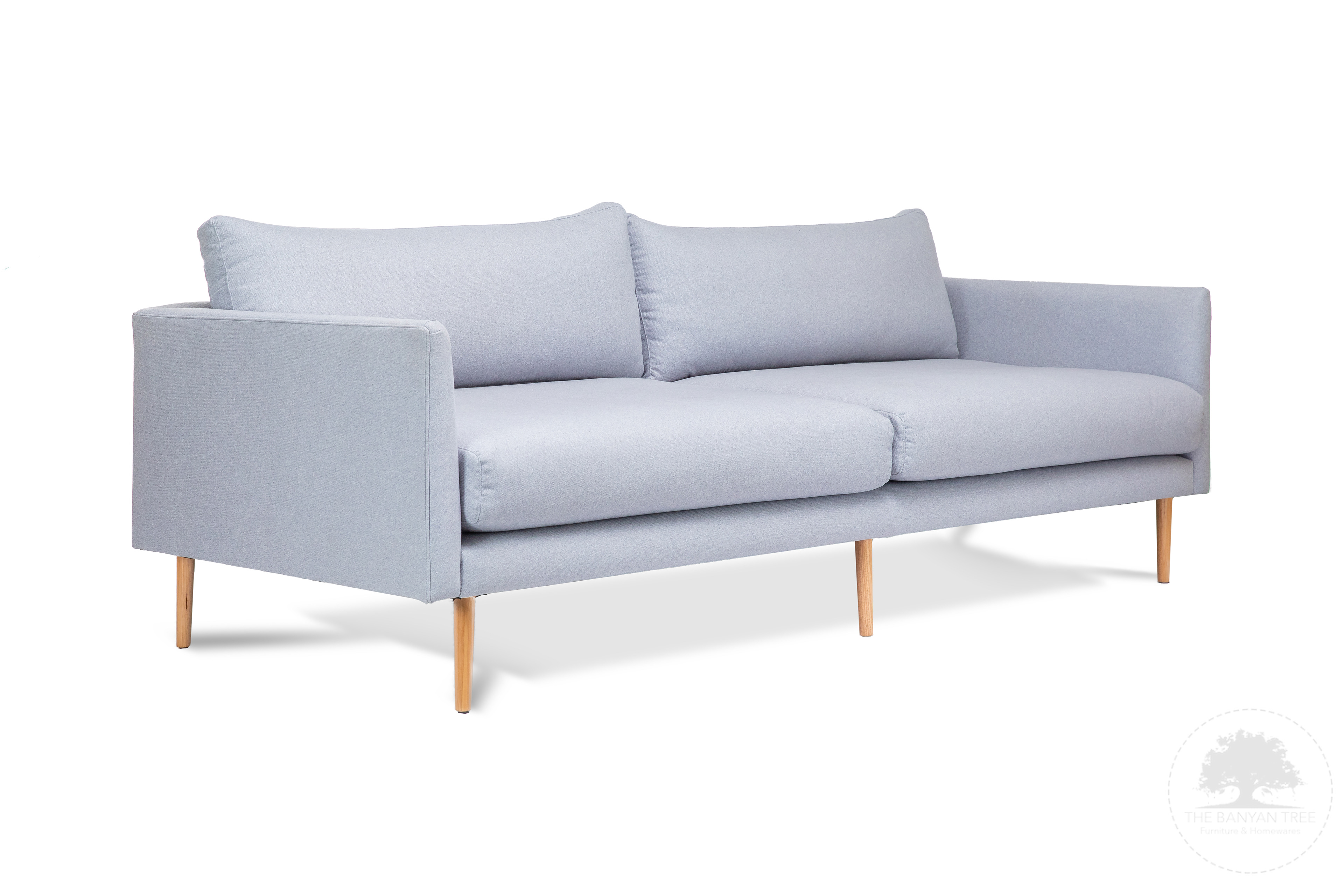 Light grey three-seat sofa on a white background