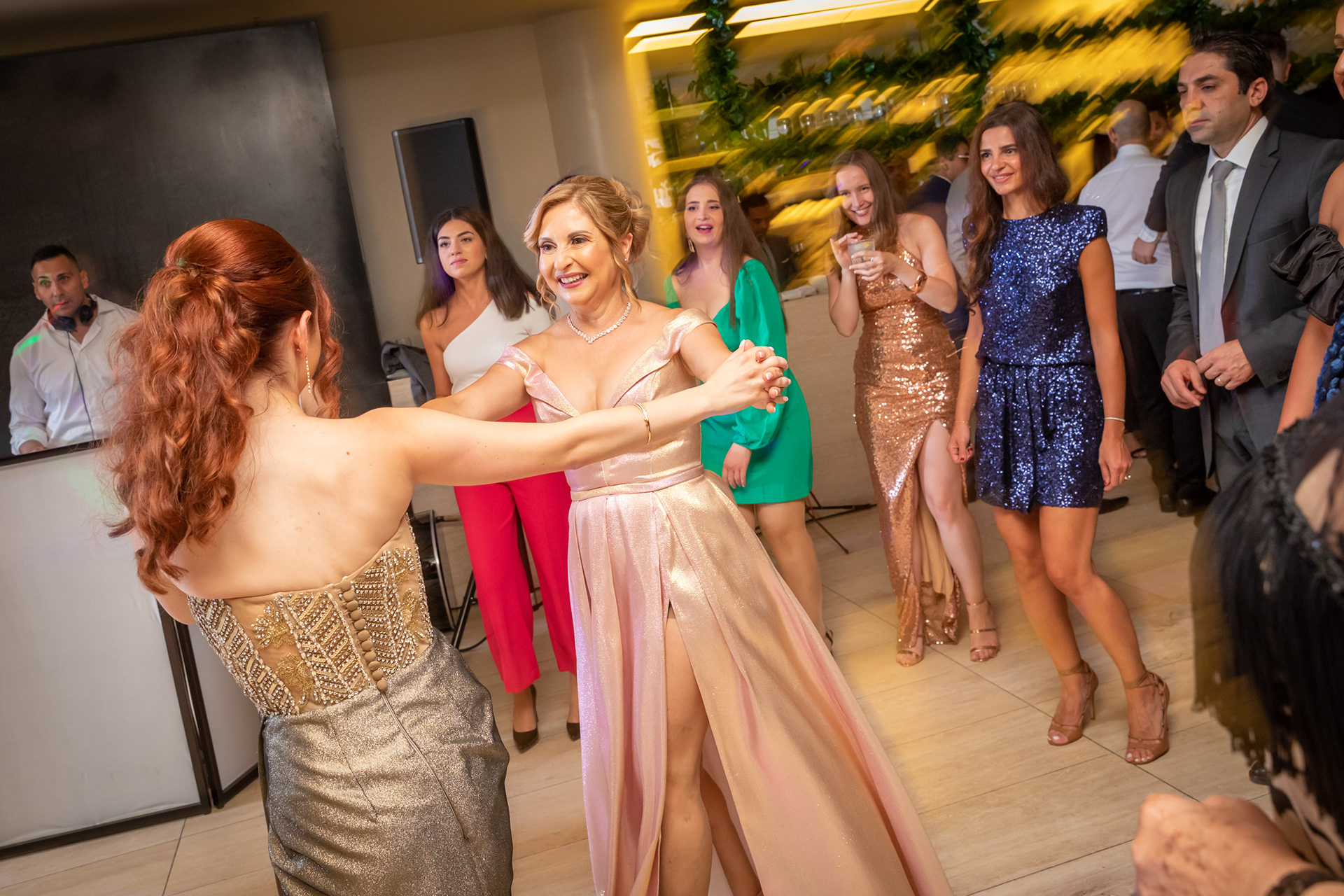 Guests dancing in formal evening wear