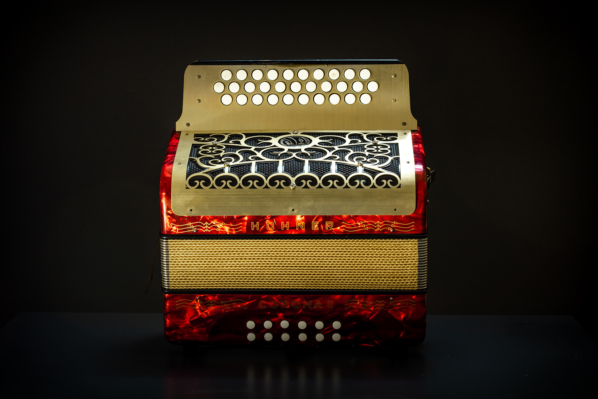 Decorative accordion photographed against a black background