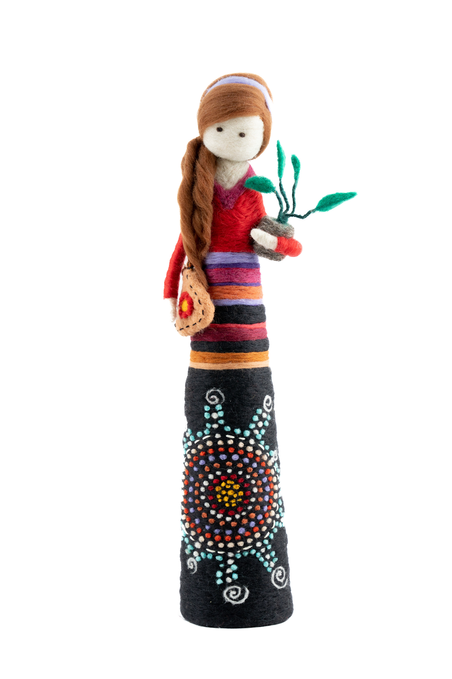 Decorative doll in a colourful patterned outfit