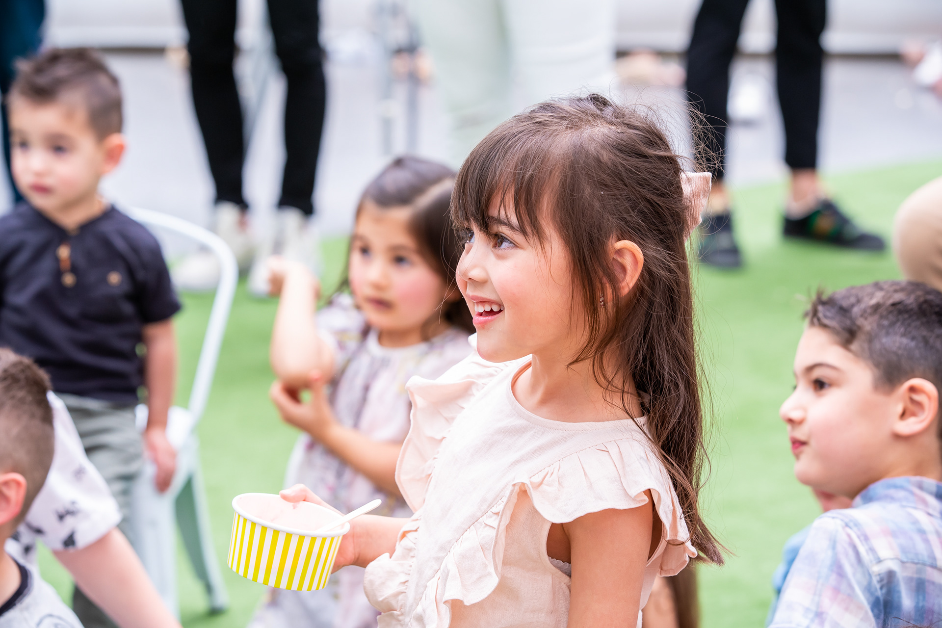 Children gathered together at an outdoor party