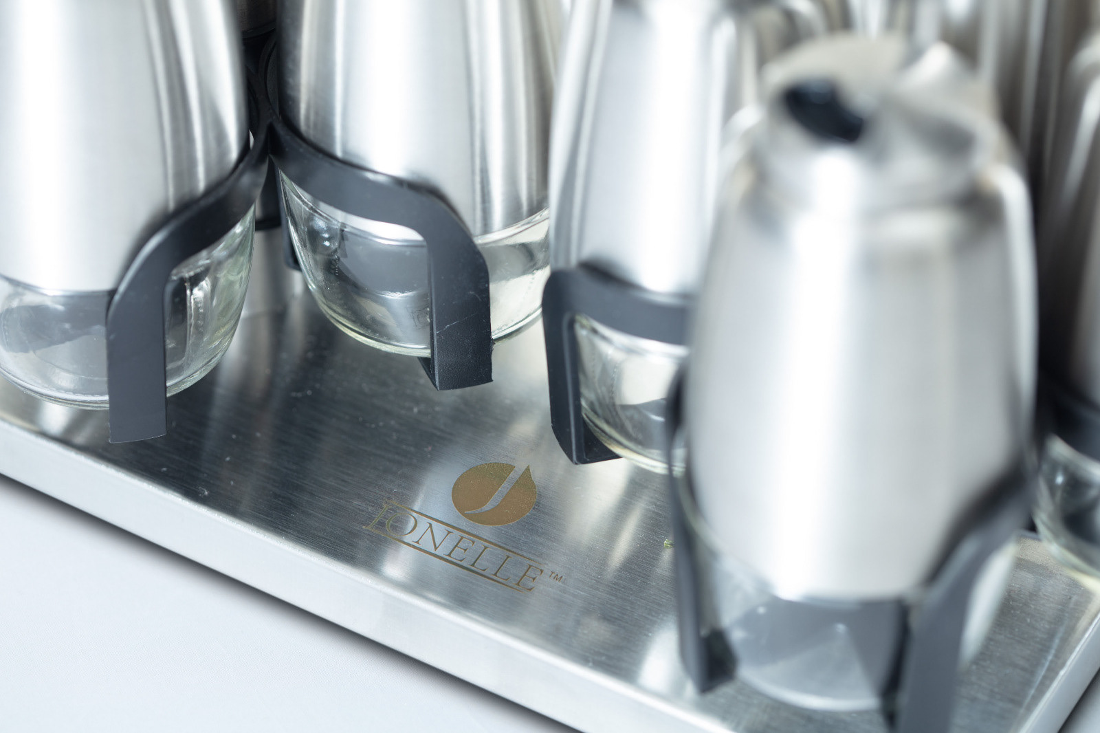 Close-up detail of stainless steel kitchen appliances
