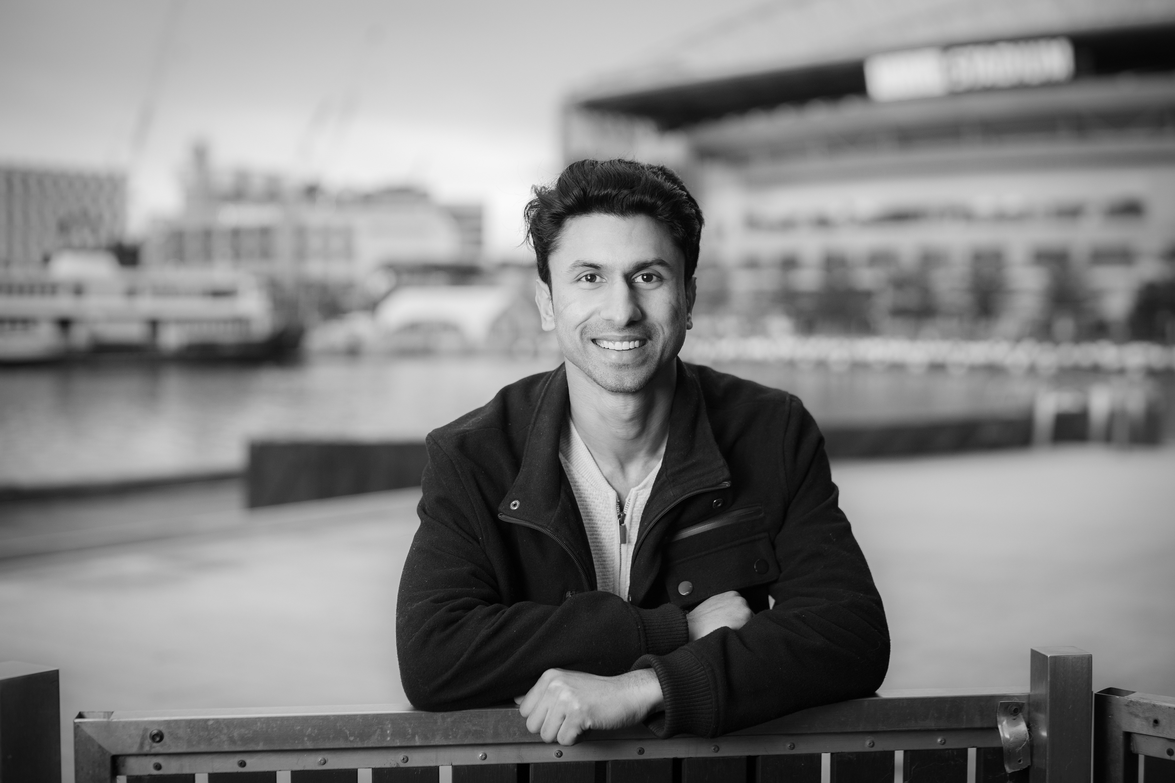 Black-and-white portrait beside the waterfront