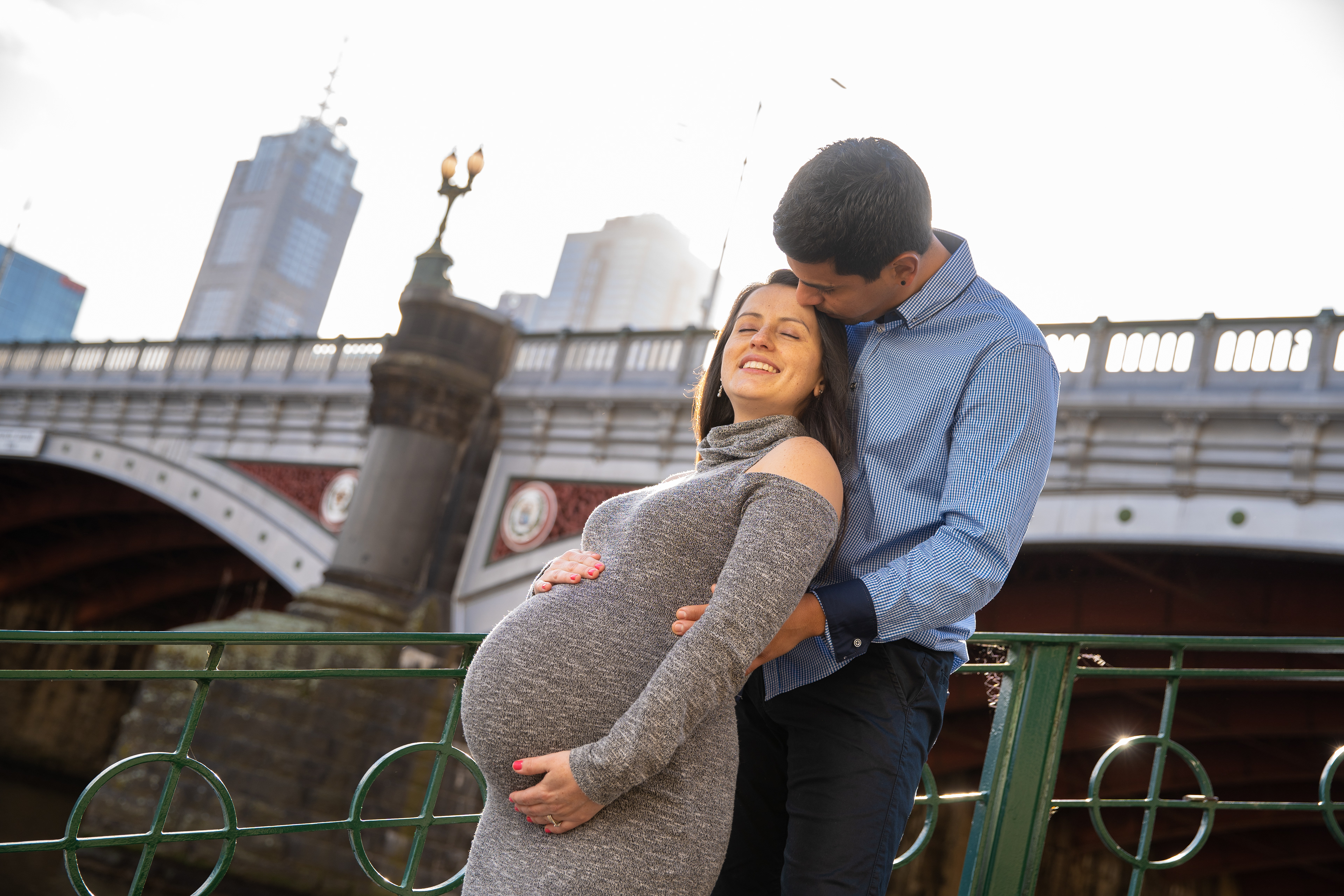 Parent and child watching the view from an outdoor platform