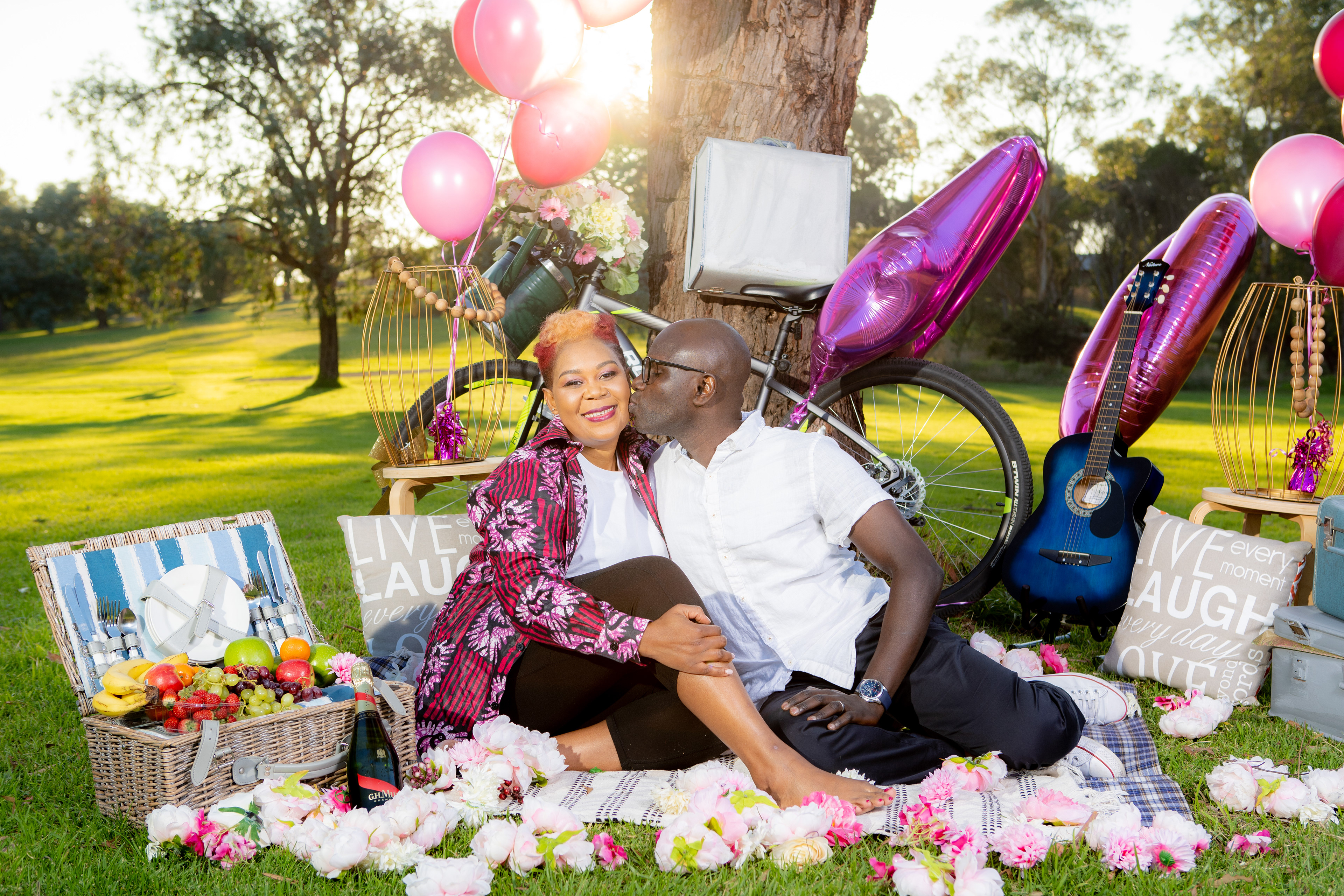 Parent and child sharing an outdoor picnic