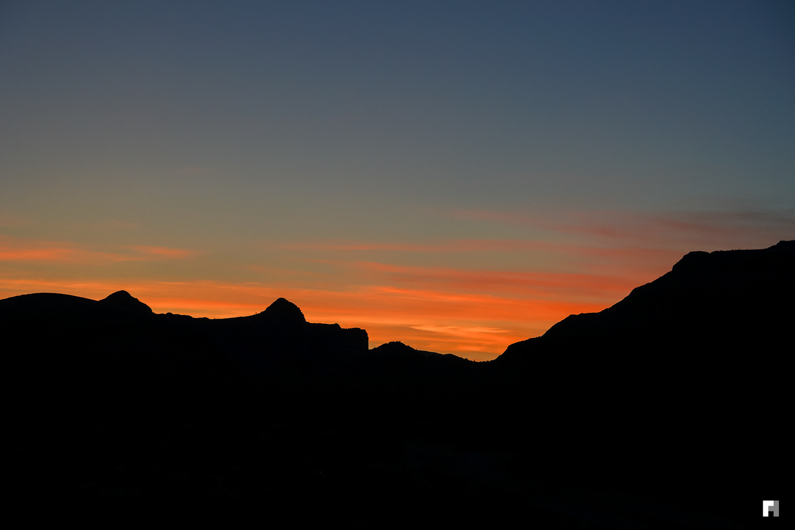 Sunset over hills in the Mojave Desert.