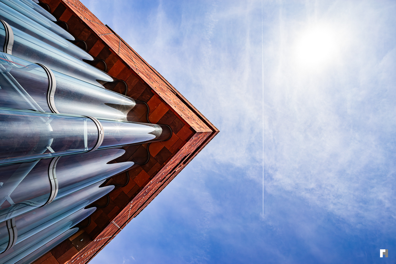 Jet passing the MAS museum in Antwerp.