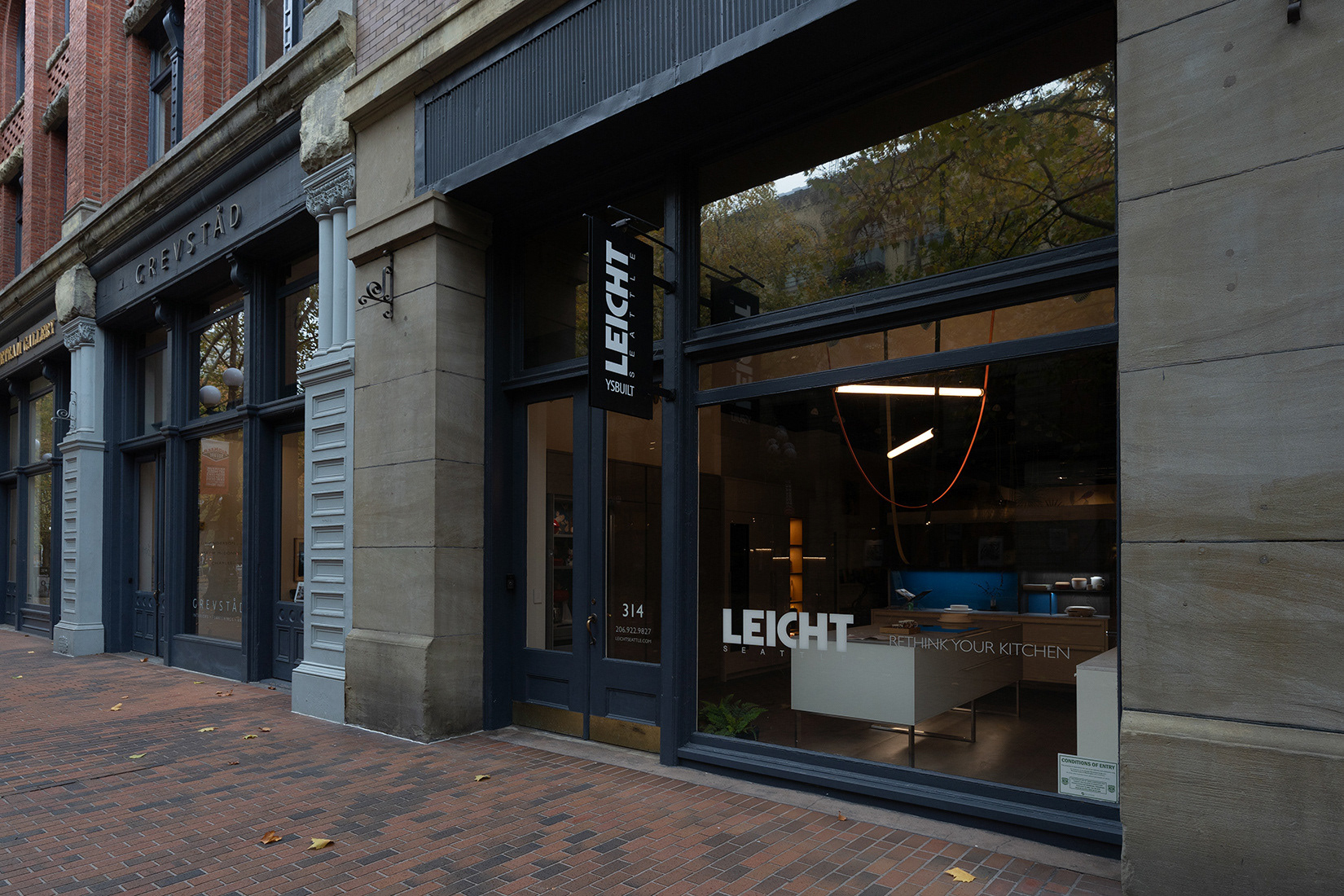 FLAG SIGNAGE & WINDOW GRAPHICS DESIGN/MOCKUP TO SIZE: LEICHT SEATTLE