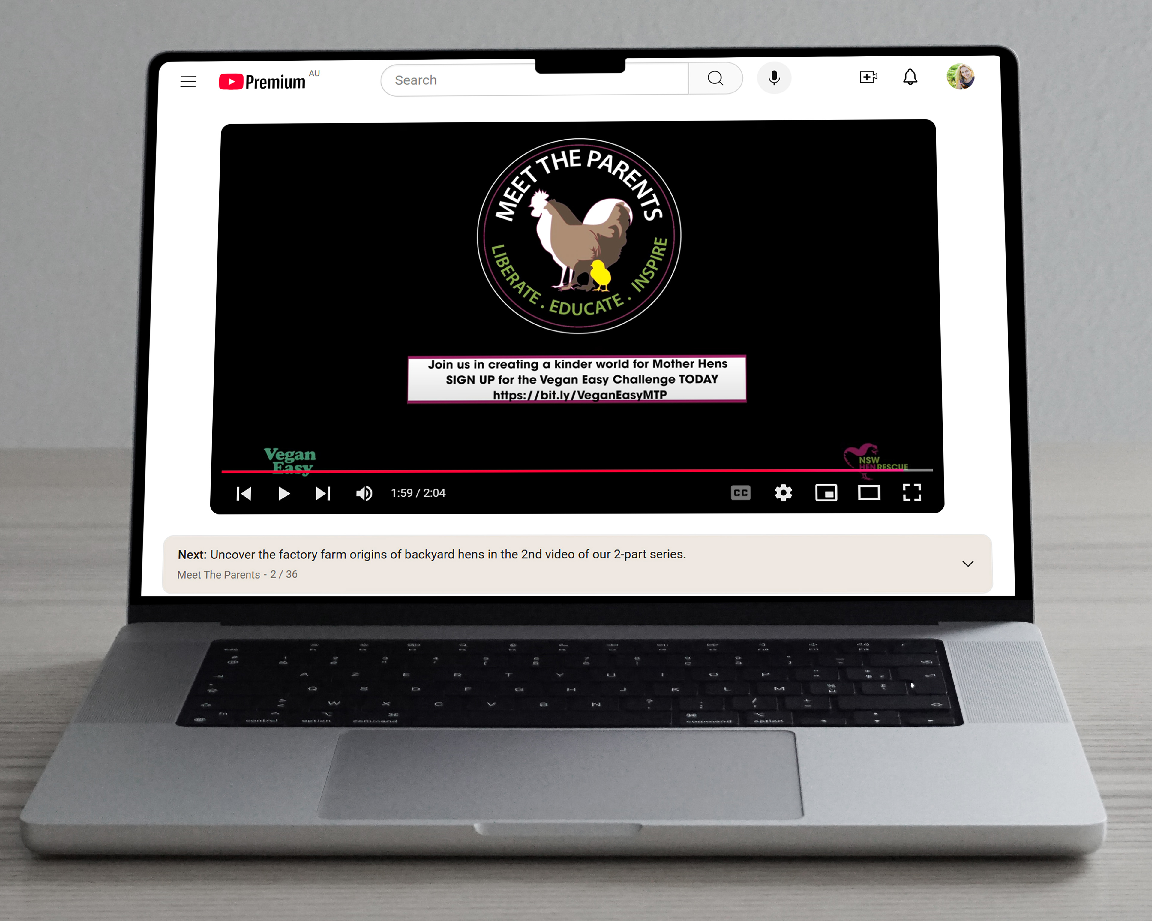 Laptop screen mockup showing the 'Meet the Parents' YouTube outro screen. The screen displays the black circular logo with 'Meet the Parents' in white and 'Liberate, Educate, Inspire' in green, surrounding a central outline of a white rooster, brown hen, and yellow chick. Below the logo in a white square bordered with purple branding colour is the call to action: 'Join us in creating a kinder world for mother hens' with a sign-up link. 