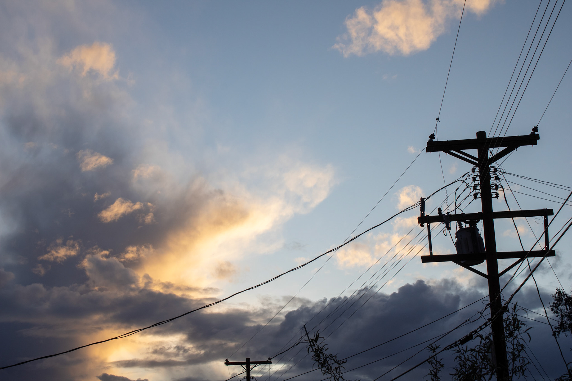 Arizona skyline with powerlines in the foreground. 