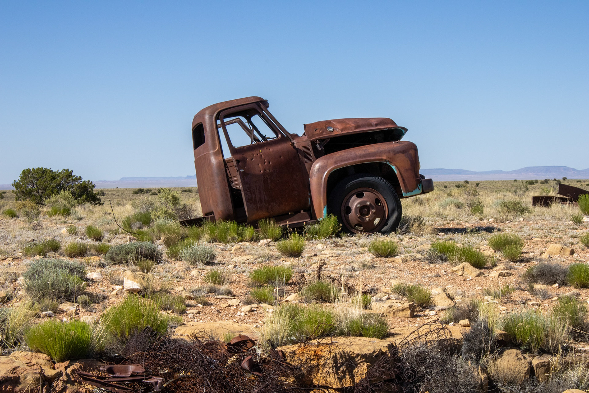 Abandoned truck in desert. 
