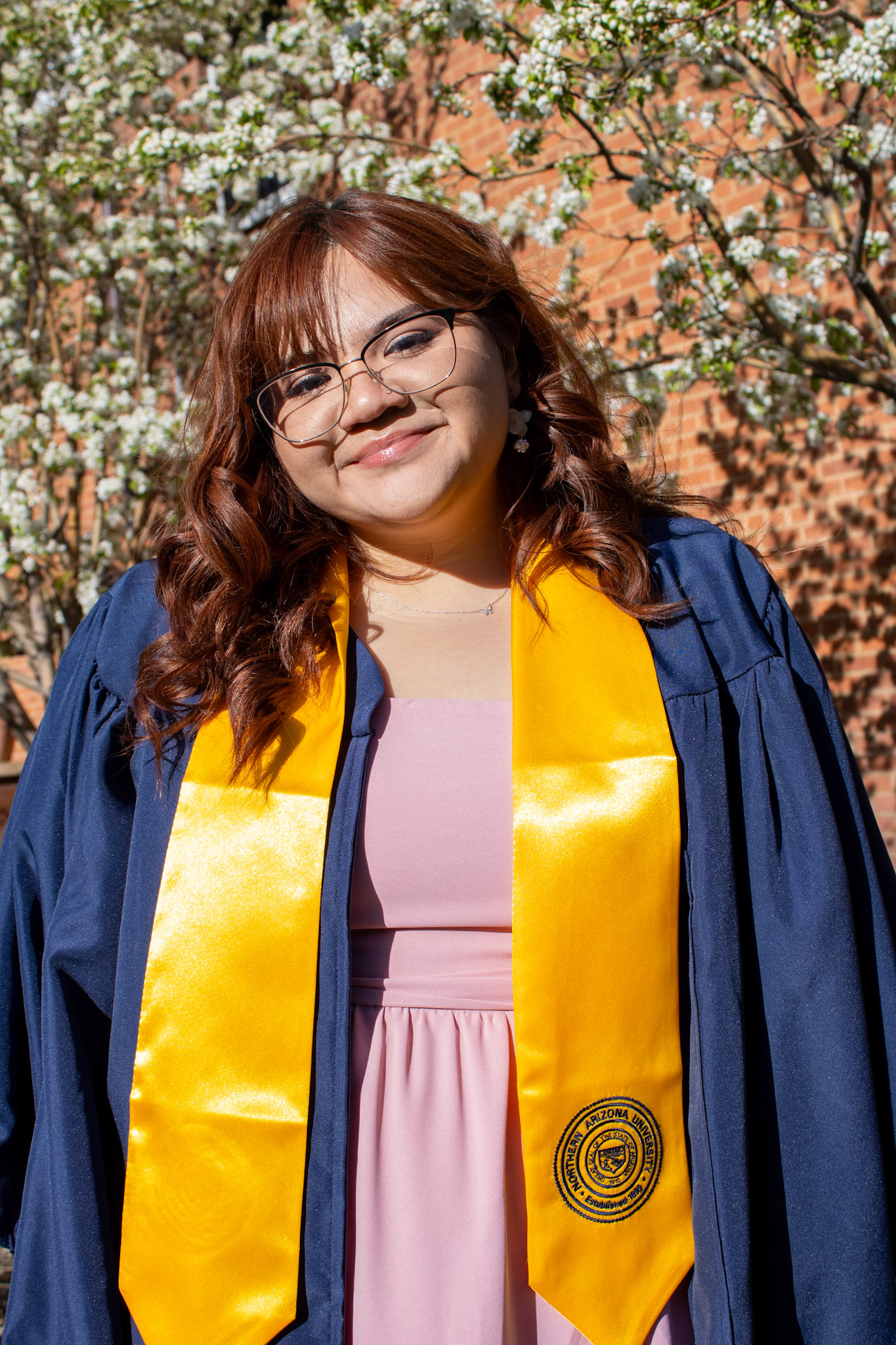 Graduate student smiling. 
