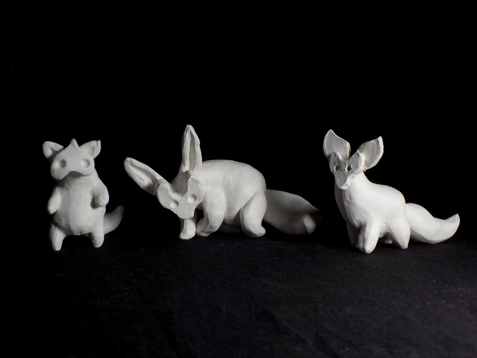 Natura Obscura: Woodland Spirits. 2018, slipcast and handbill ceramic stoneware, UV paint, 50 total ranging from 1” to 5” tall, Prismajic LLC, Denver and the Museum of Outdoor Arts, Englewood.