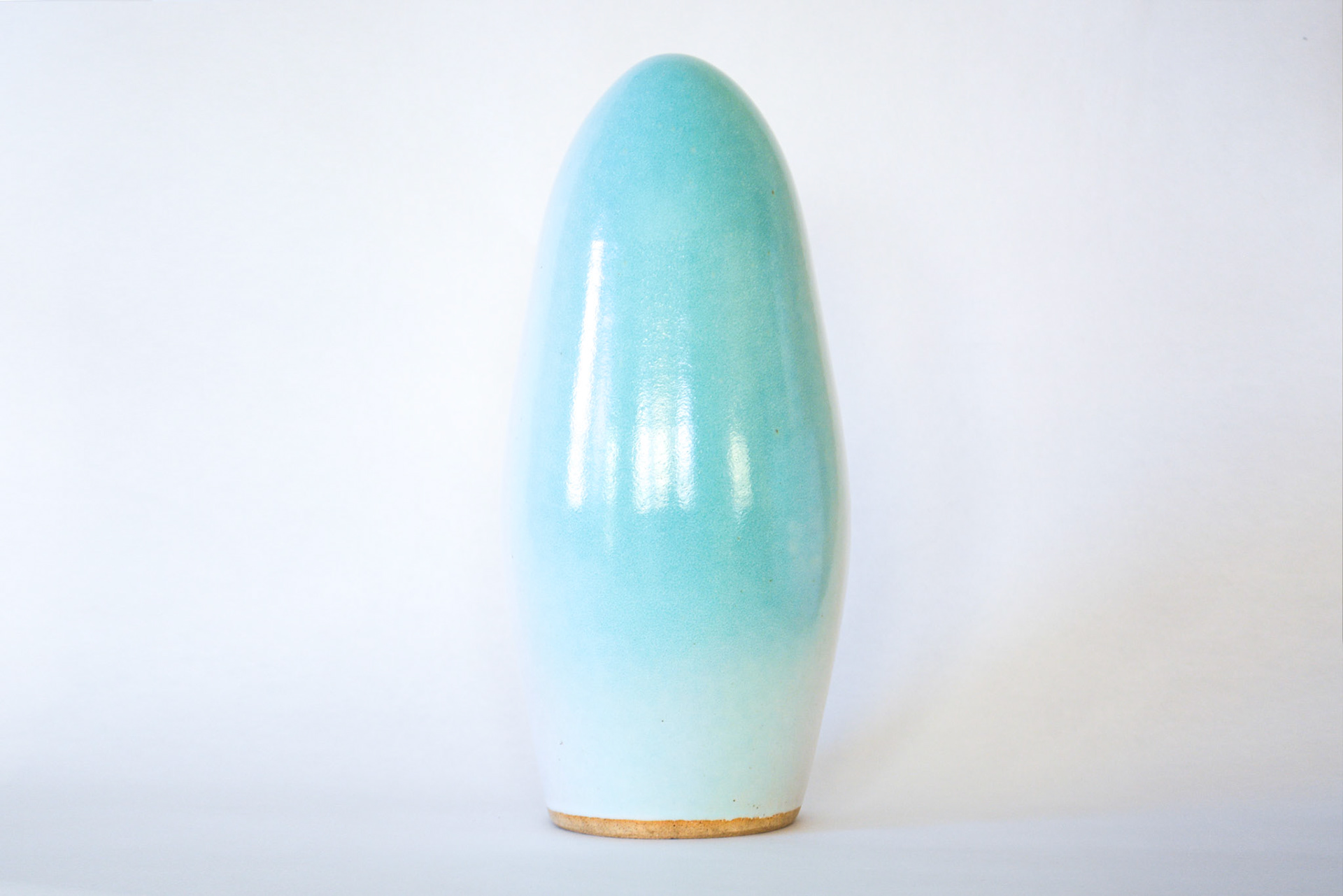 Green shadow ellipsoid. 2024, glazed ceramic stoneware, 4.5” x 4.5” x 10.75”h.