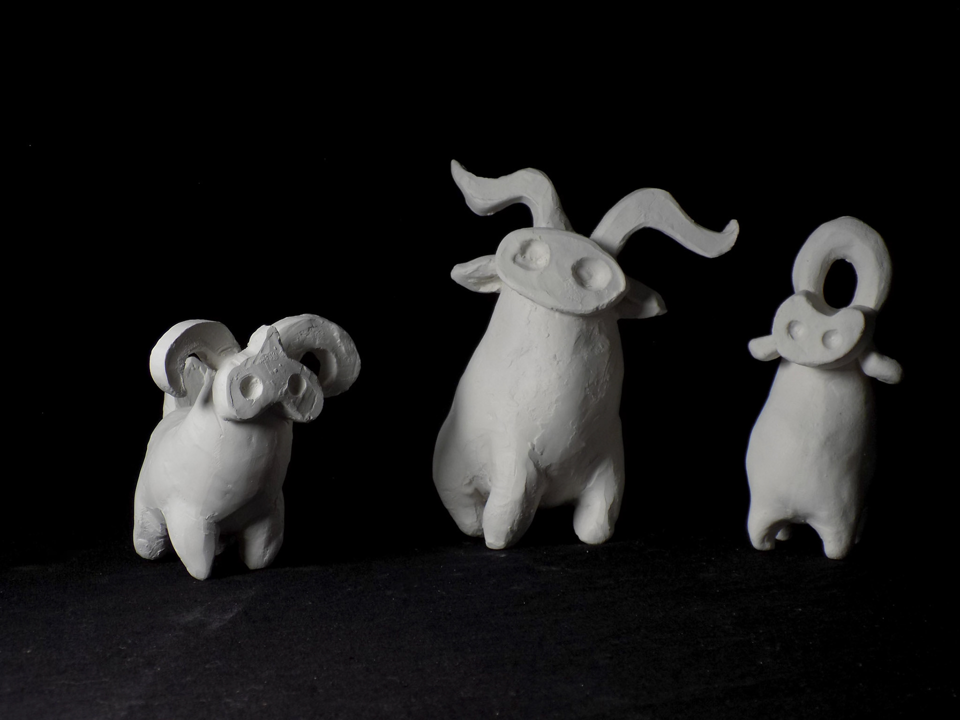 Natura Obscura: Woodland Spirits. 2018, slipcast and handbill ceramic stoneware, UV paint, 50 total ranging from 1” to 5” tall, Prismajic LLC, Denver and the Museum of Outdoor Arts, Englewood.