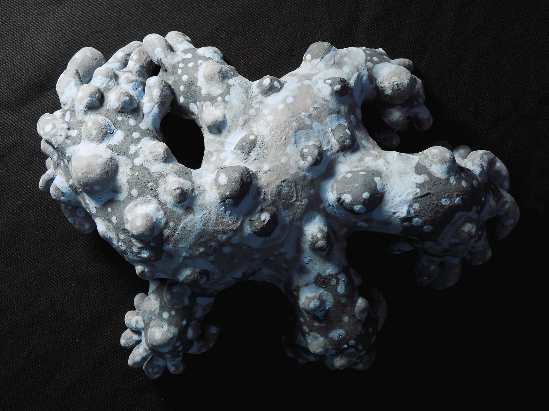 The Dying Gaul, 2018, ceramic stoneware, black iron oxide, underglazes, 2.5”x8.5”x7”, Under "Store to Own" Contract