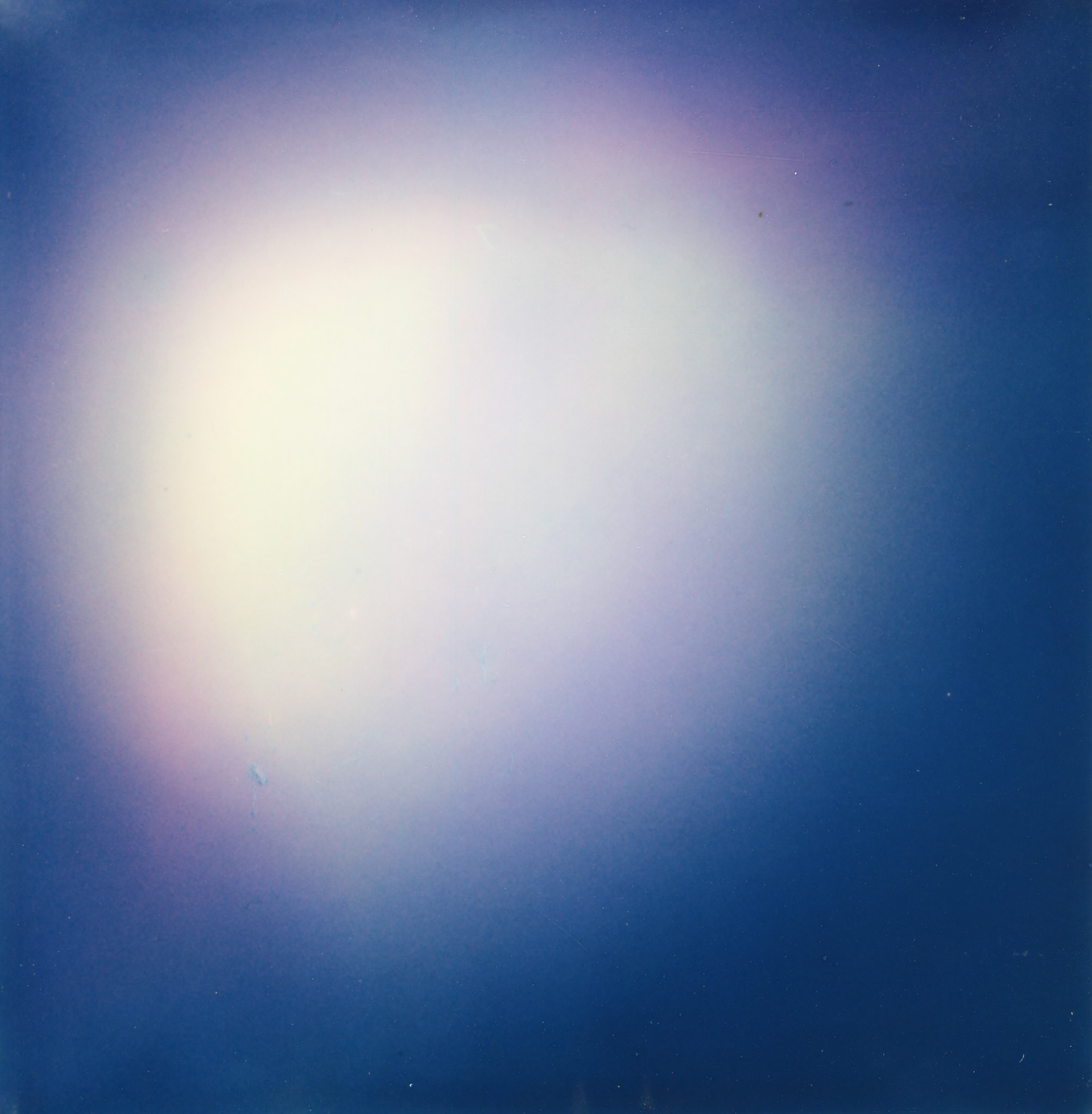 Waking Up. 2023, enlarged polaroid, 24" by 24".