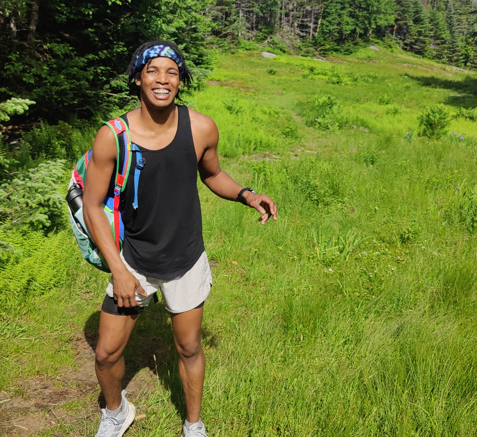 Jerome smiling while hiking in Mt. Mansfield