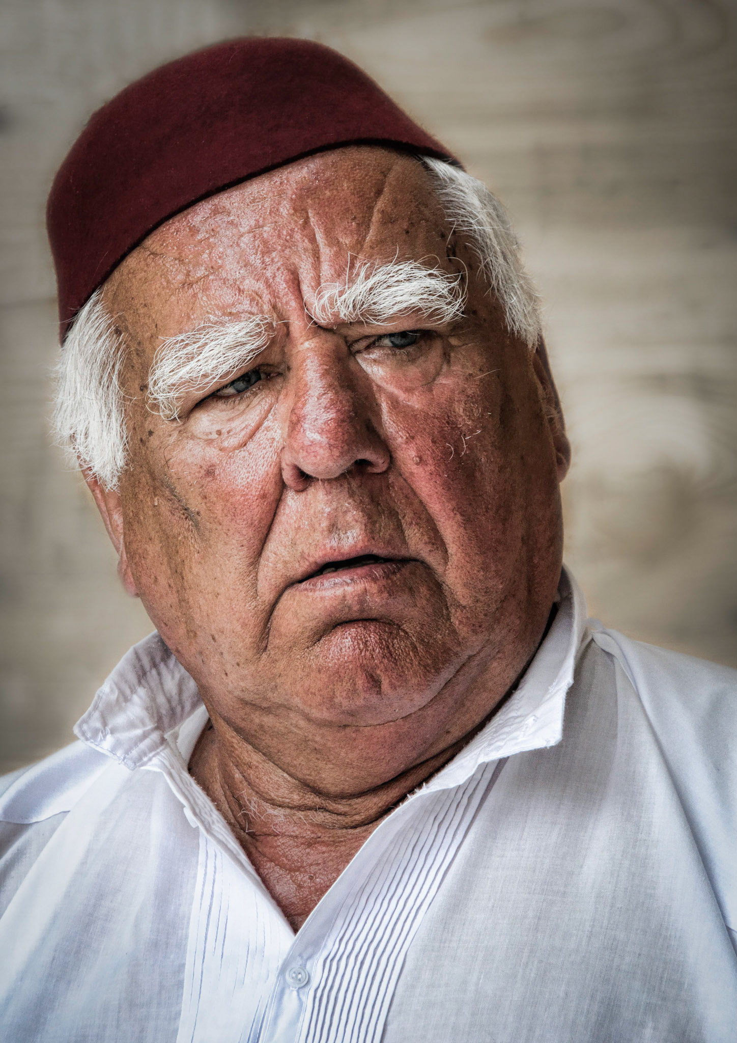 A Sreet Musician in Dubrovnik, Croatia. He wsn't as grumpy as he looks.