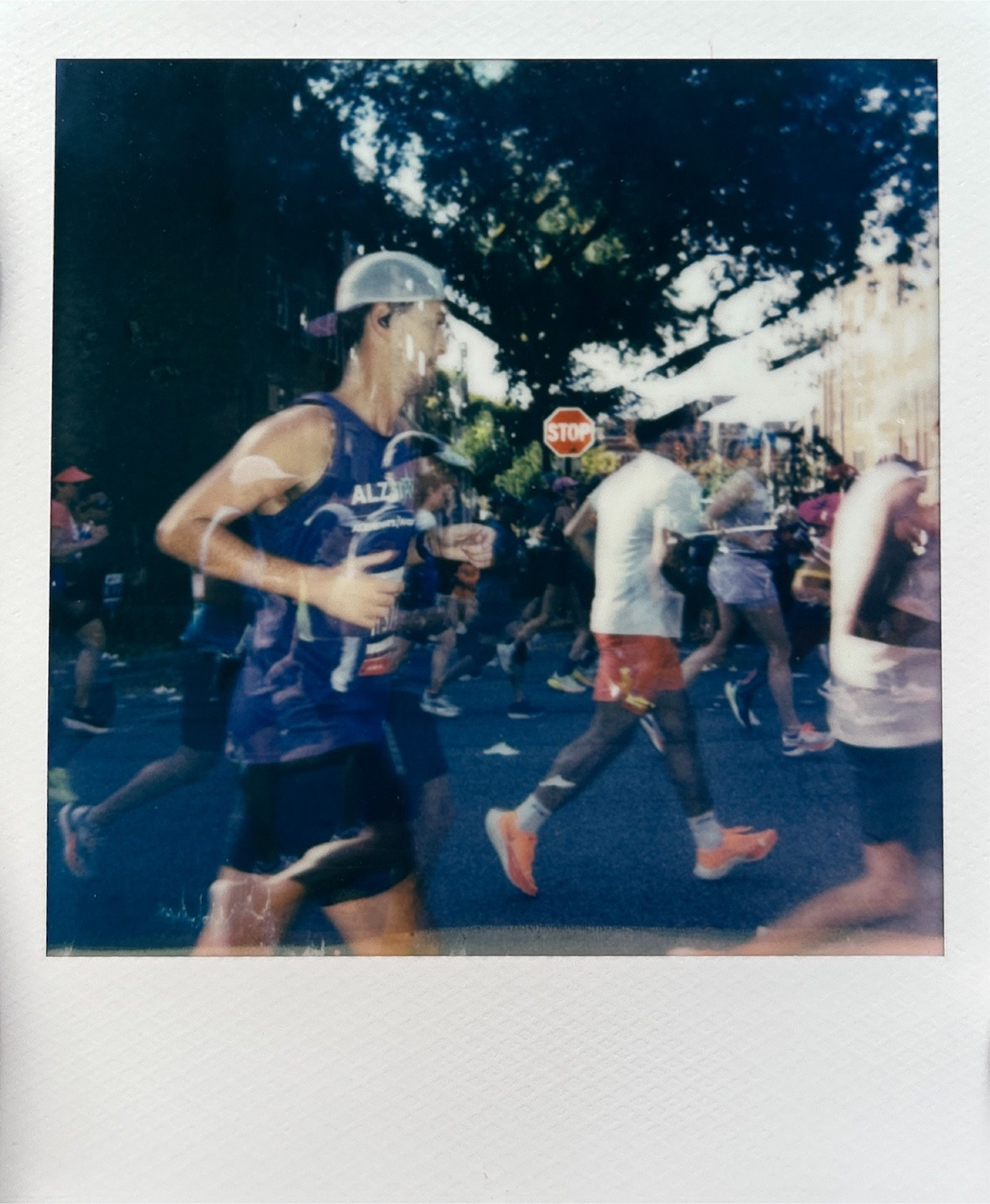 Carly Behm "Runners," 2024. Polaroid double exposure. 3.5 in × 4.25 in