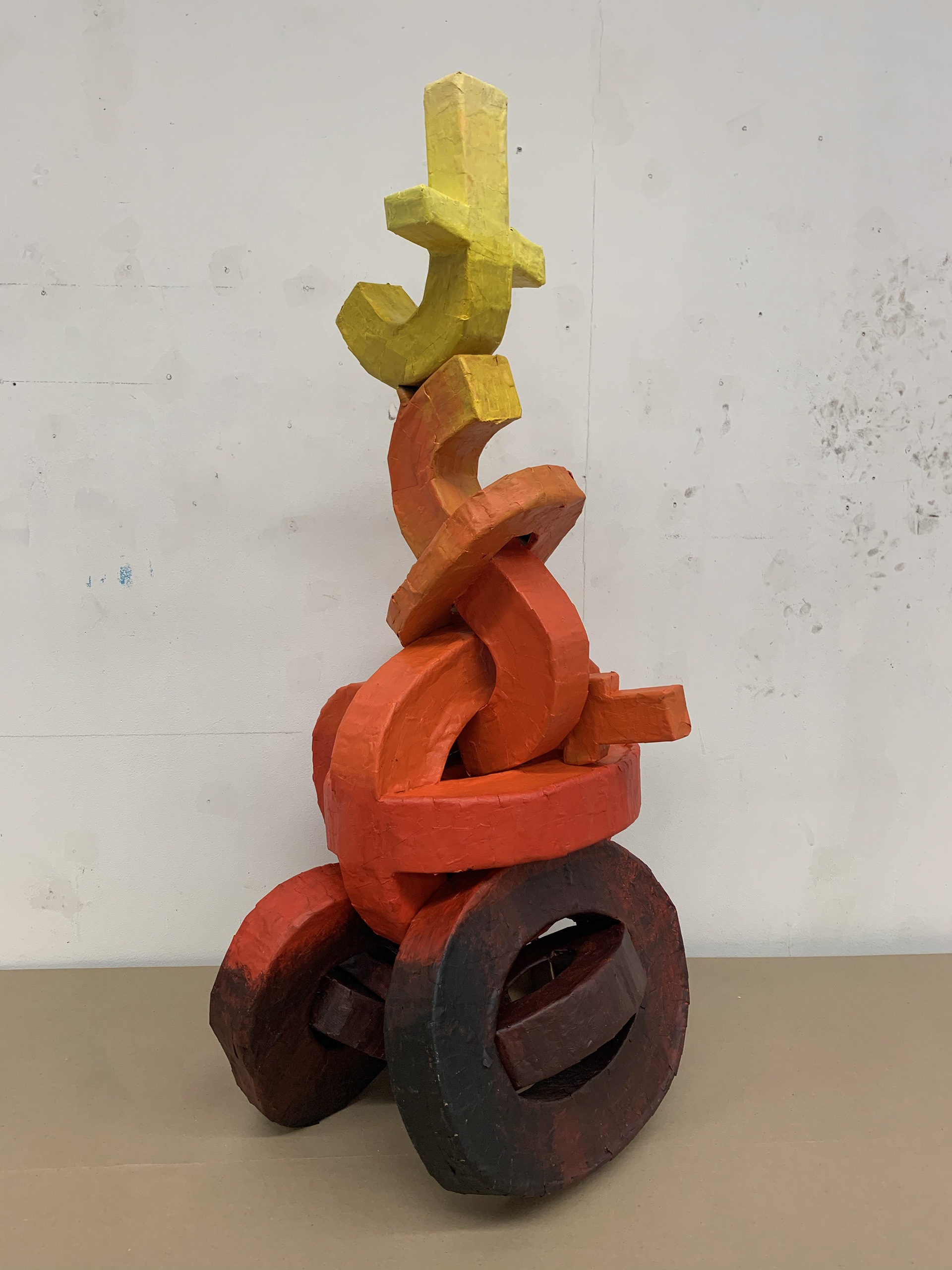 Conceptual Conflagration (Medium: cardboard). Concept was taking a singular form and adding more to replicated forms to create a cohesive piece.