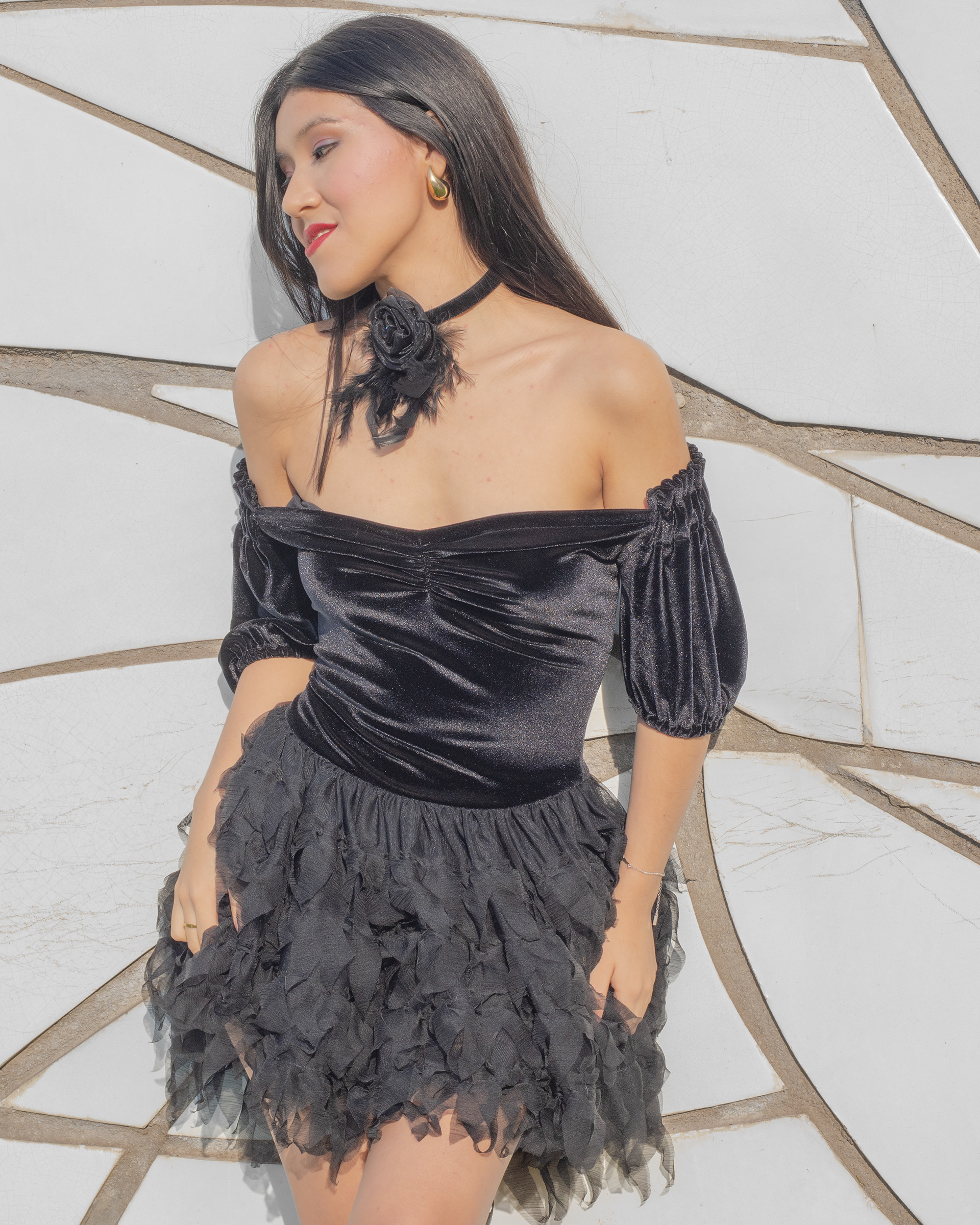 Model Ariadna Torrico wearing Tina Kolesnikova black dress