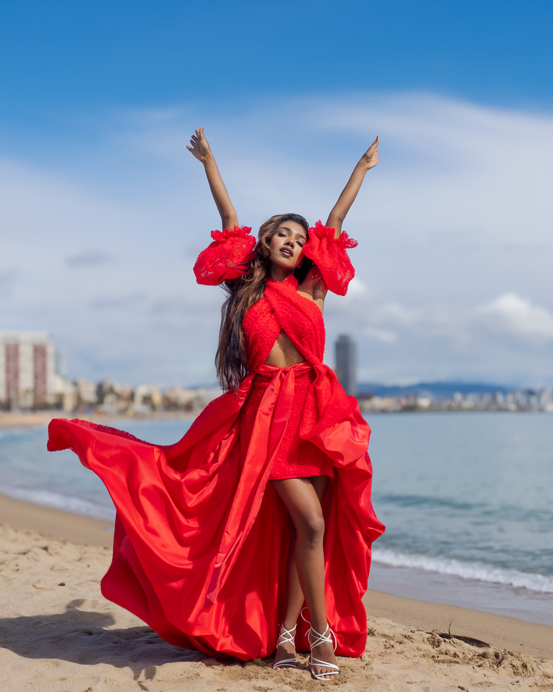 Model Anoeradha wearing red dress by Tina Kolesnikova