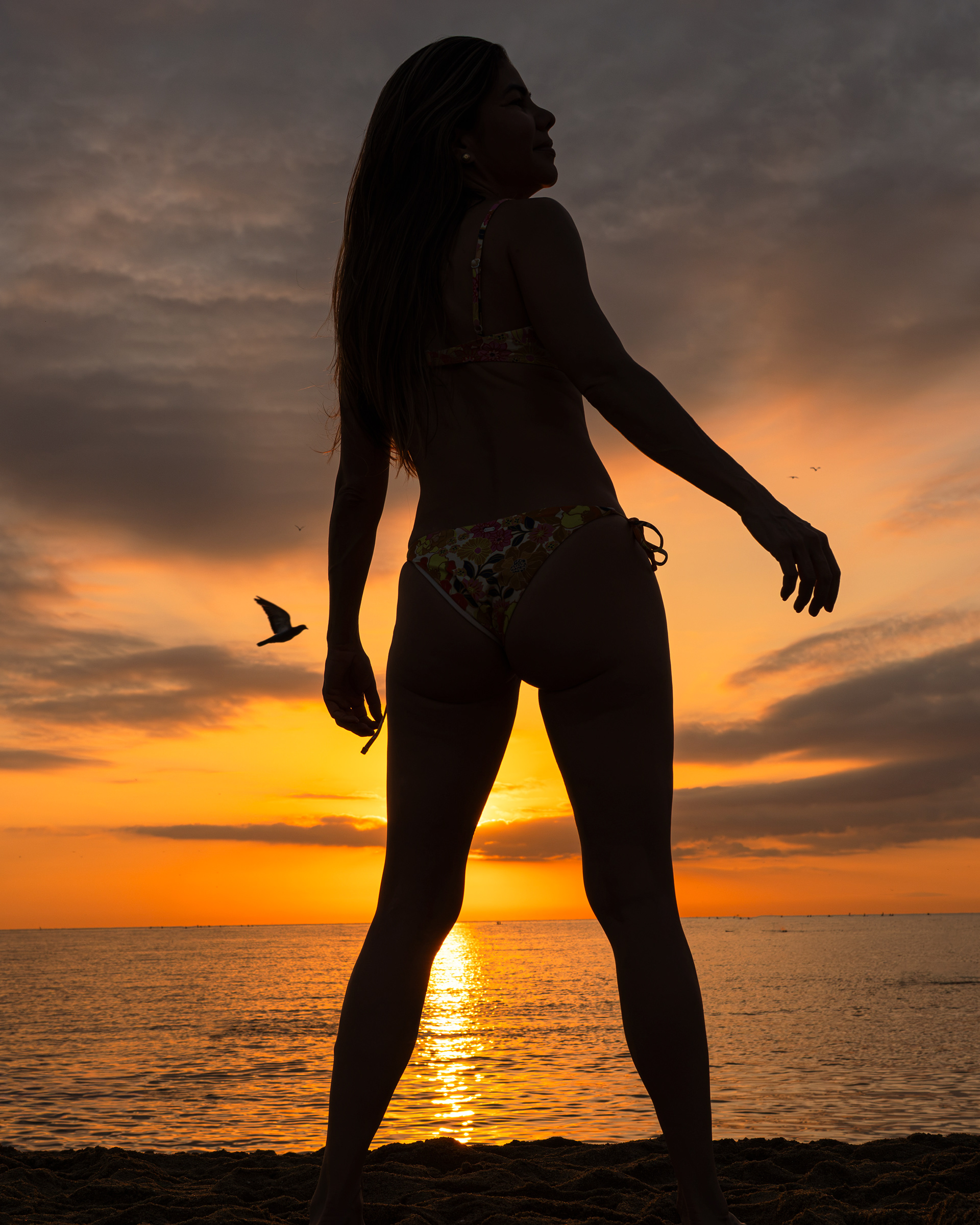 silouette barceloneta beach sunrise