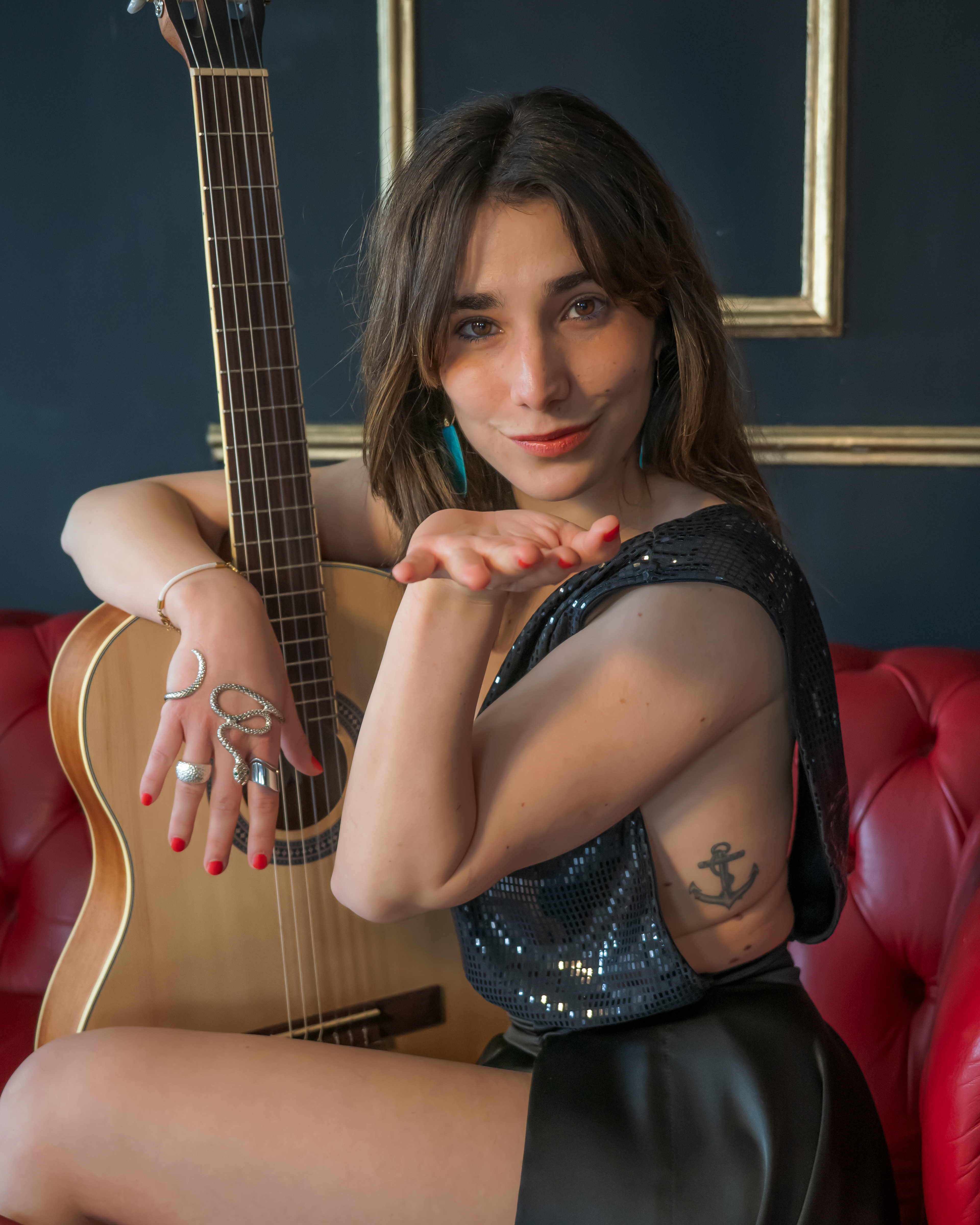 Spanish Singer-songwriter wearing Tina Kolesnikova Desing