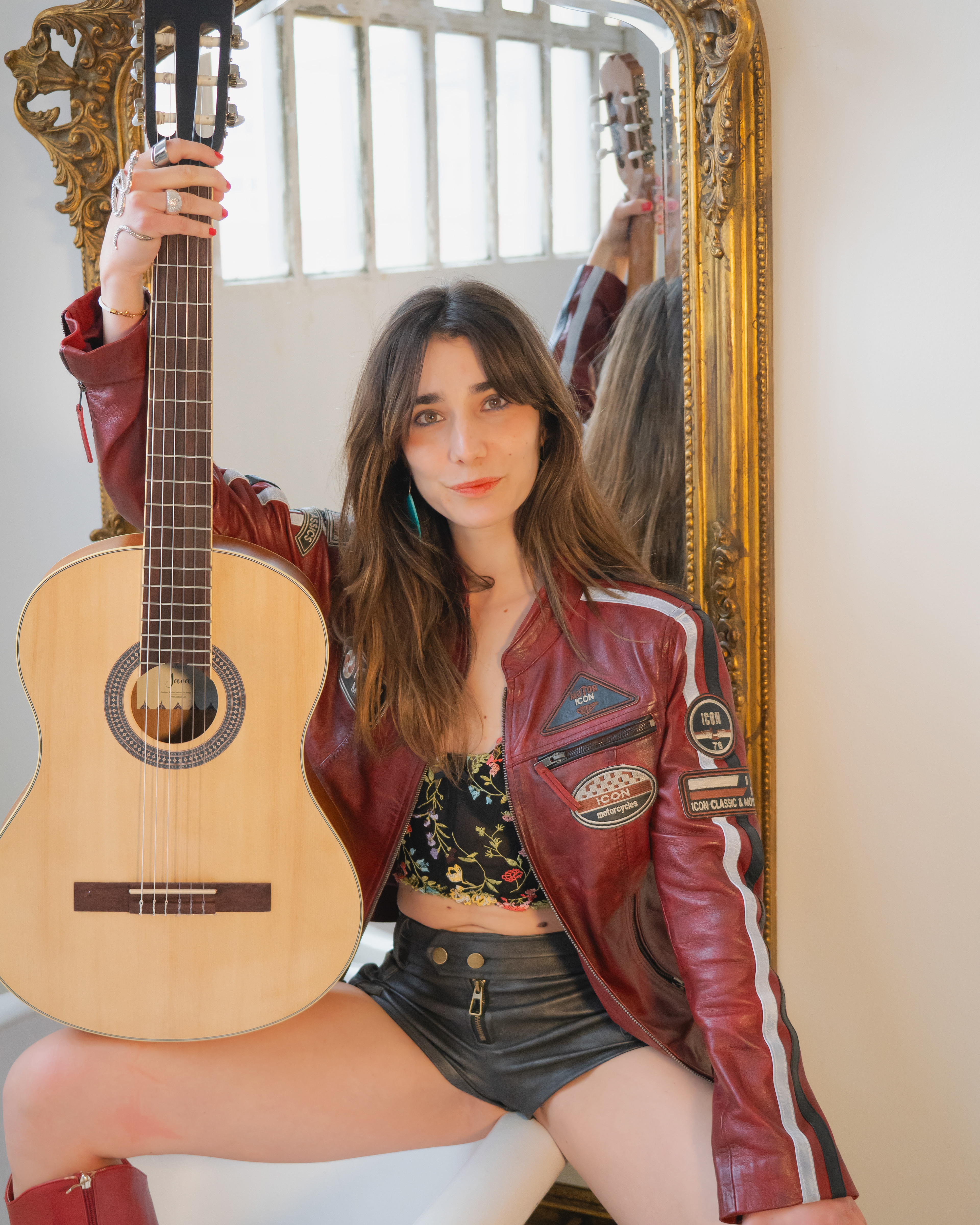 Spanish Singer-songwriter Arual with guitar
