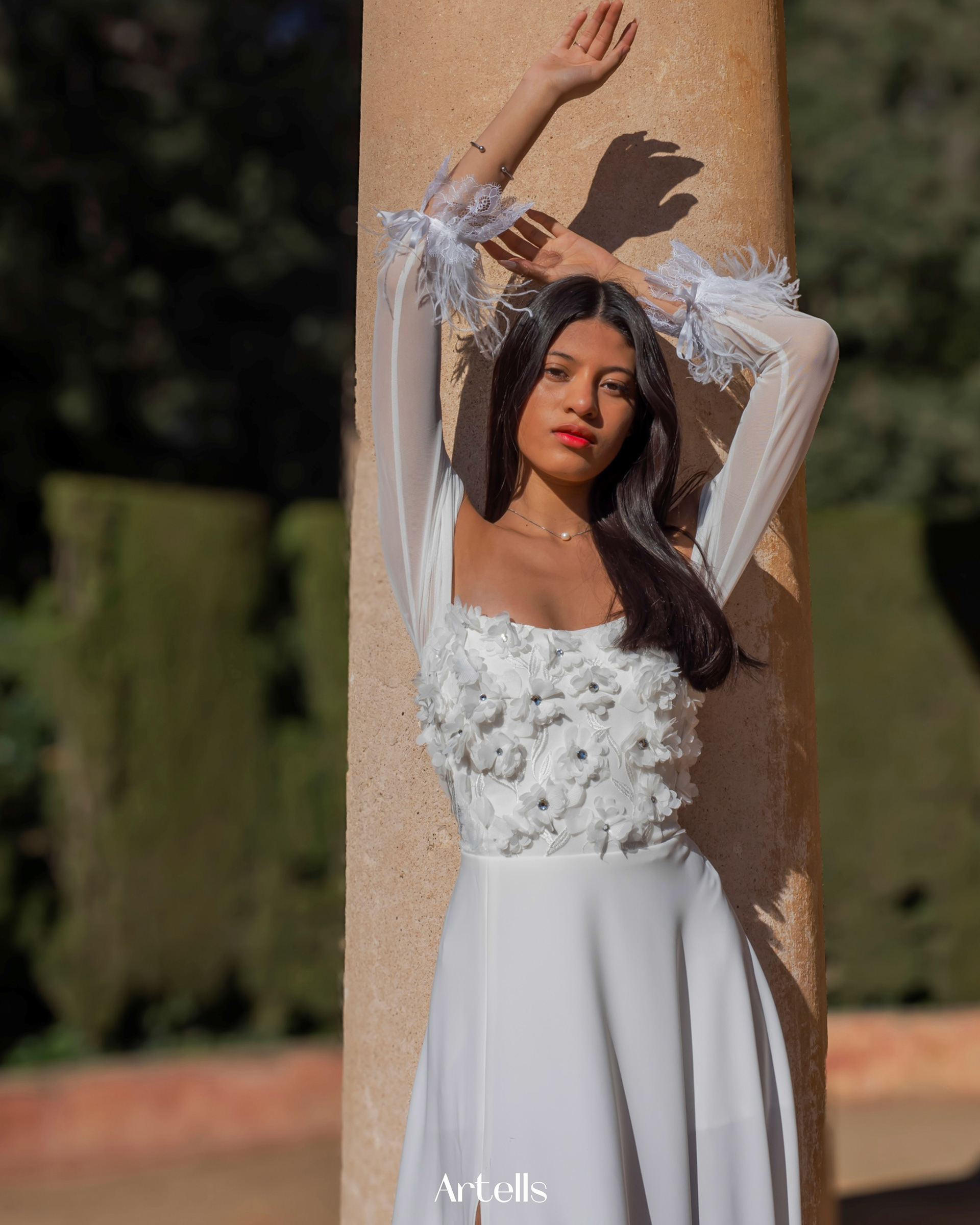 Ashley Sanchez modeling with white dress