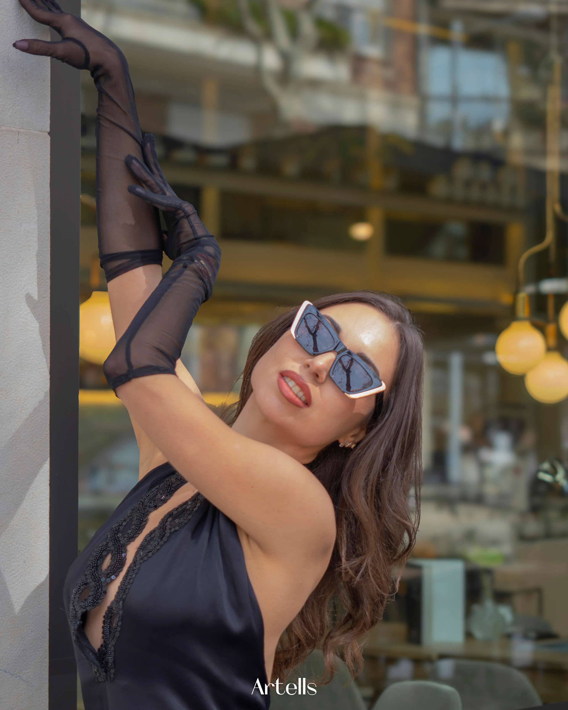 Model Madina Ism modeling in a Cafe