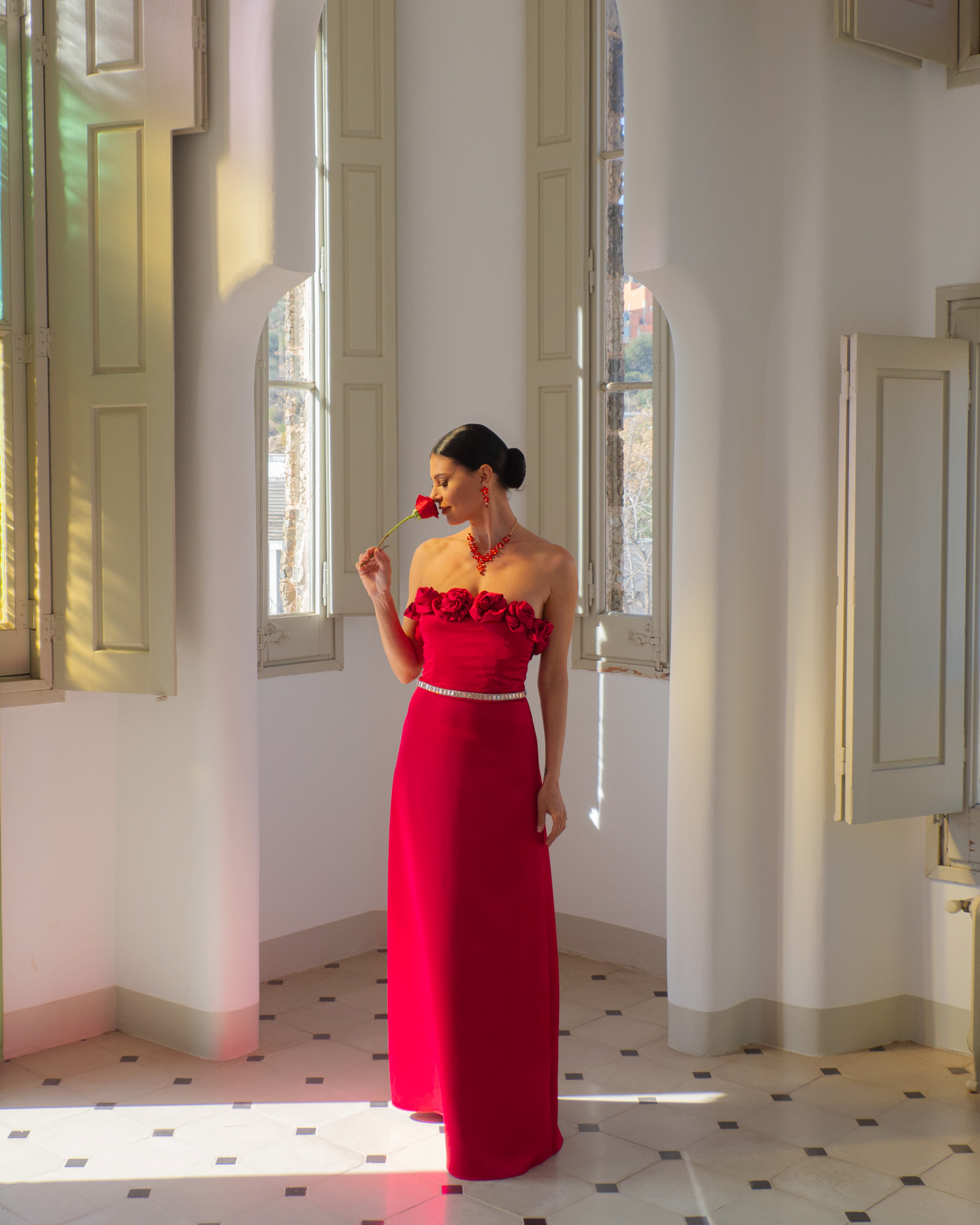 Margarita Vidal waring red dress