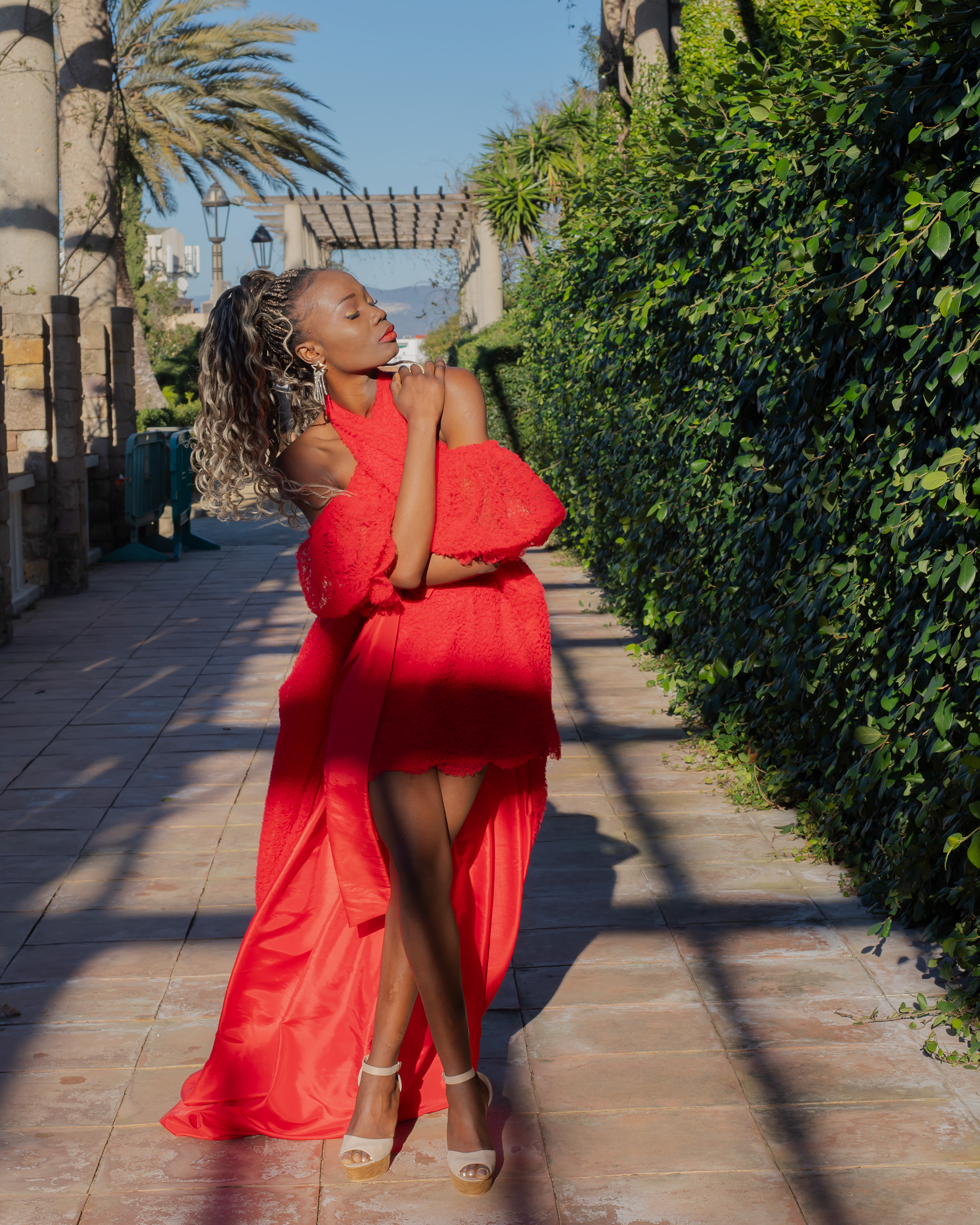 Model Nina wearing red dress