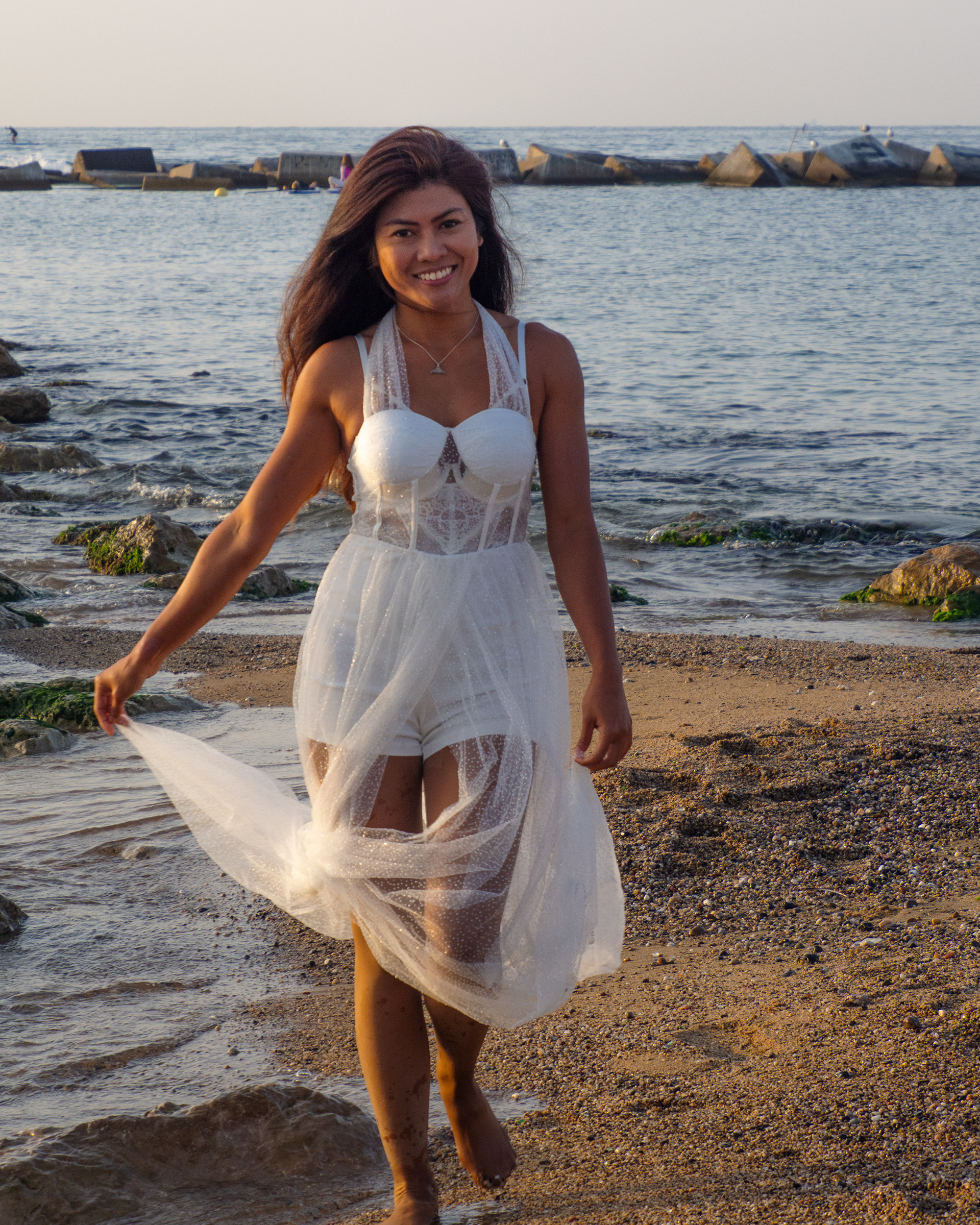 Azura Moktar waring white dress