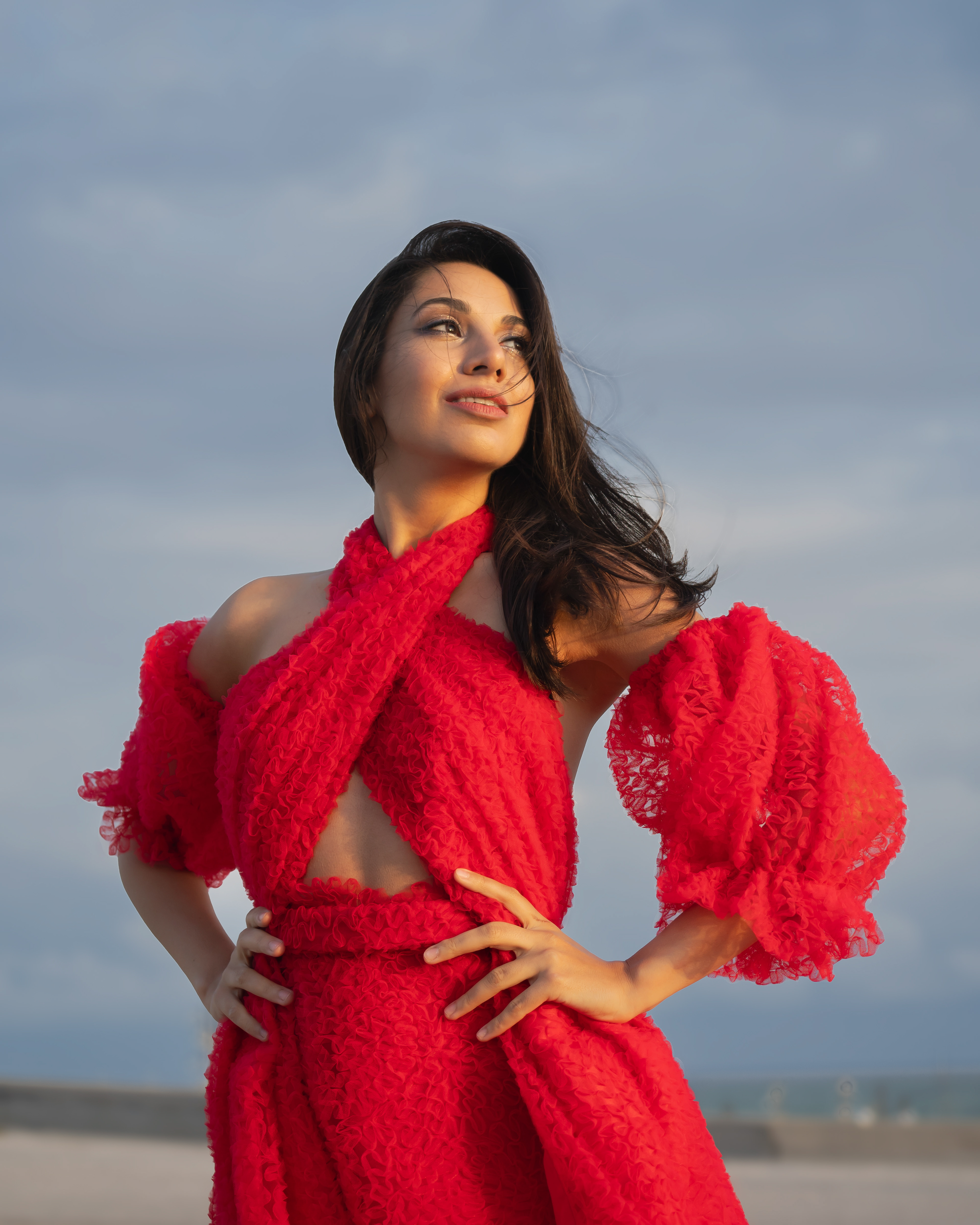 Oksana Pavlova waring red dress