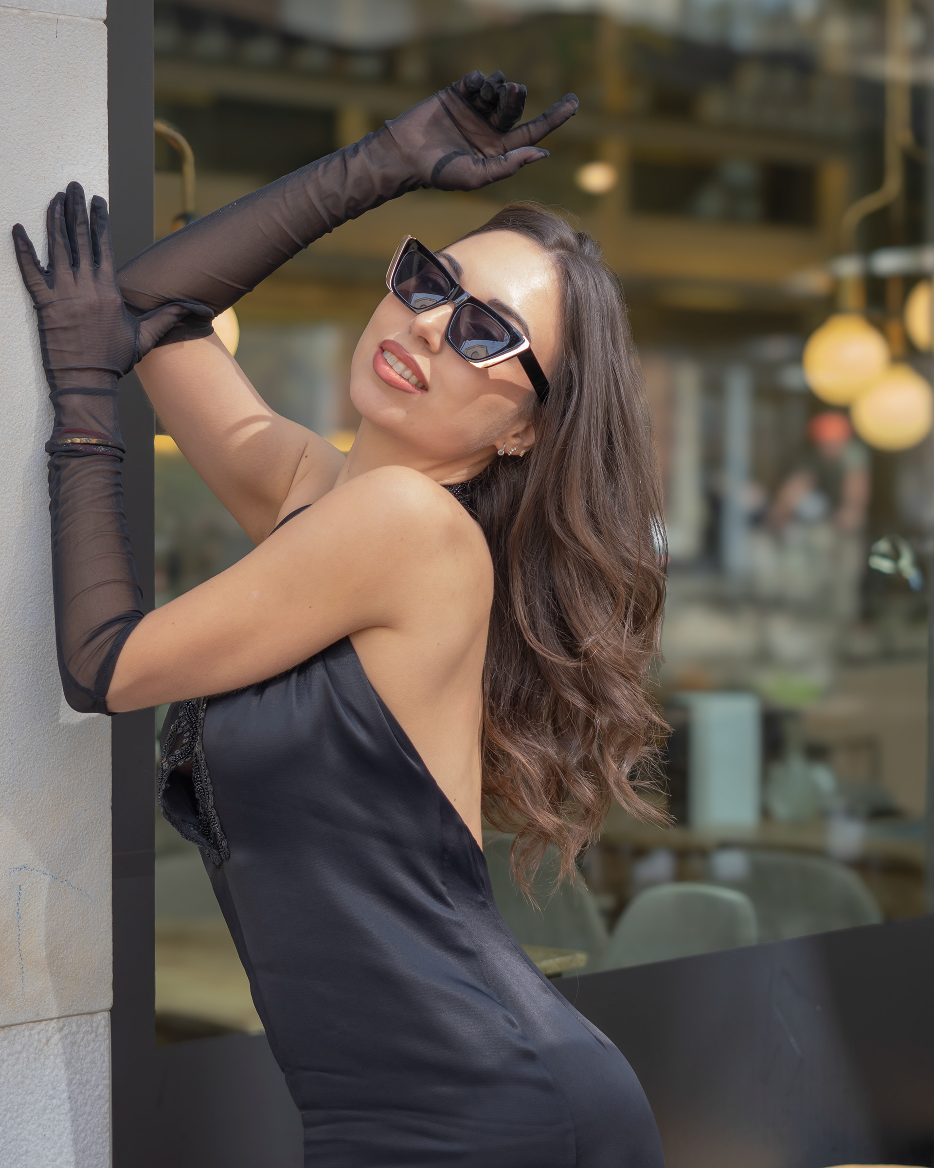 Model Madina Ism in a Café