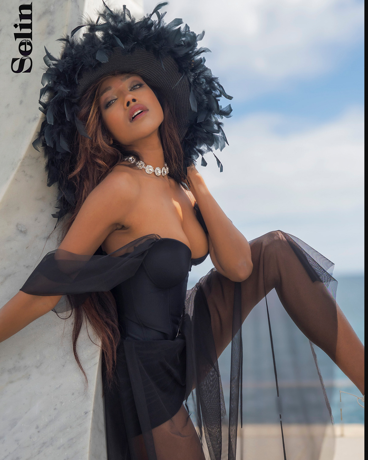 Model & Actress Anoeradha Rostam  with balck dress by Tina Kolesnikova