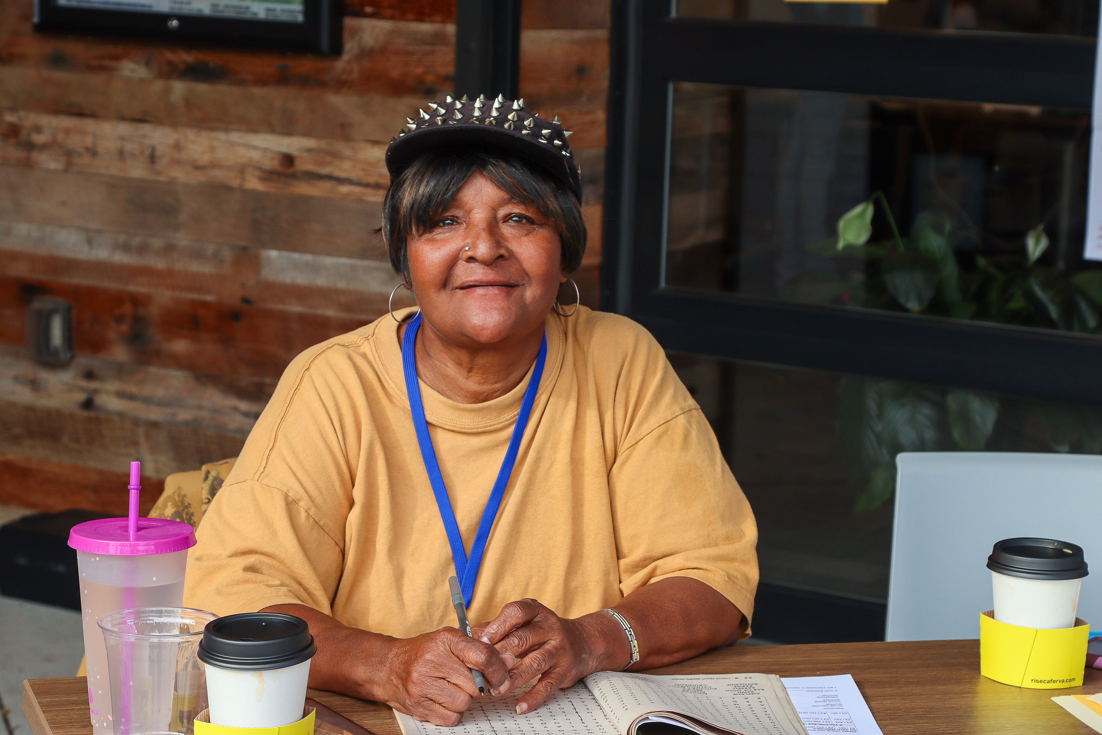 A poll worker eagerly waits for voters at Rise Cafe in Richmond, VA.