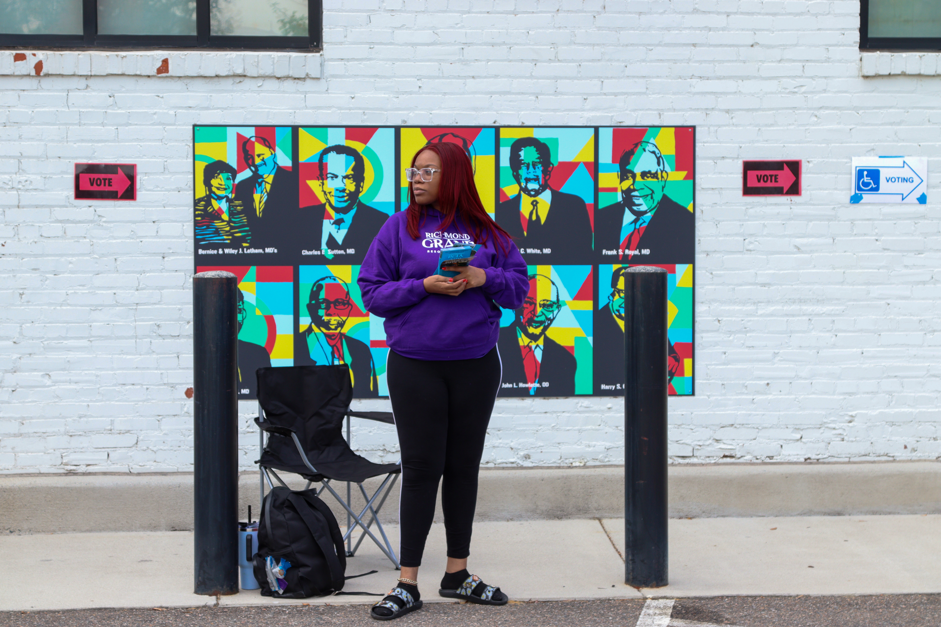 A canvasser is standing ready to answer questions about the Casino referendum at Rise Cafe in Richmond, VA.