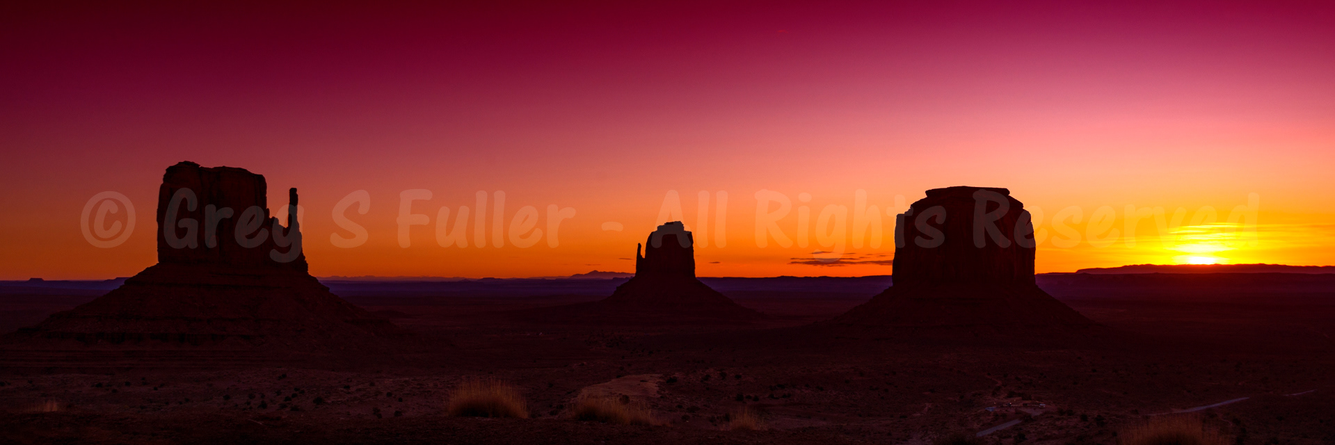 A Red Sunrise over the Mittens - Monument Valley - Oljato-Monument Valley, Arizona