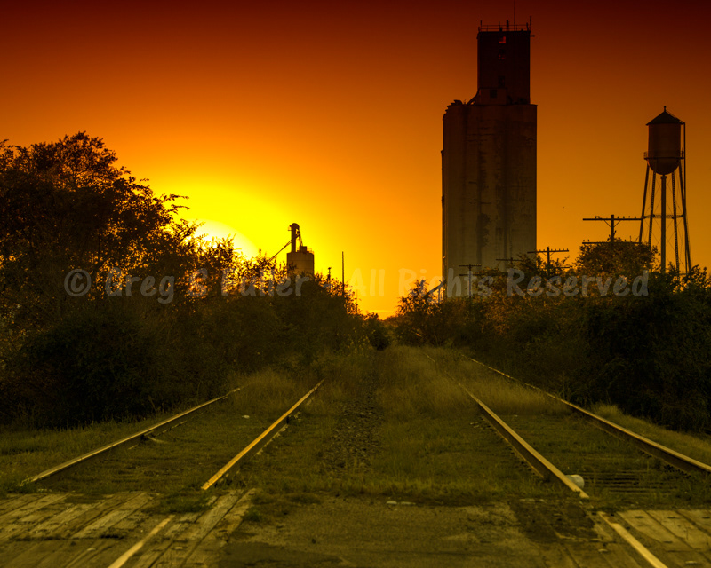 A Golden Sunset over the Sentinel of the Plains - Grain Elevator & Water TowerEads, Colorado