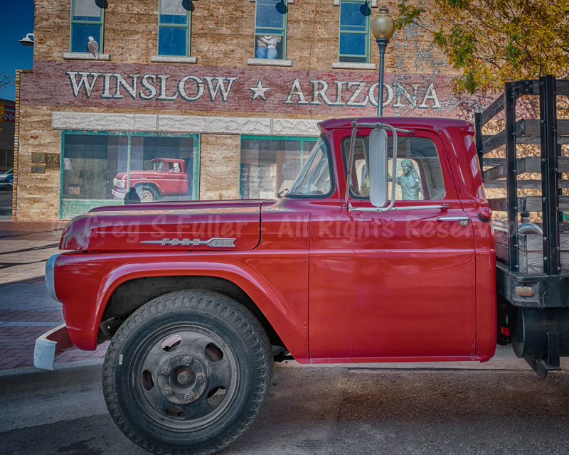 Standin' on the Corner - Red Flatbed Ford Truck - Winslow, Arizona