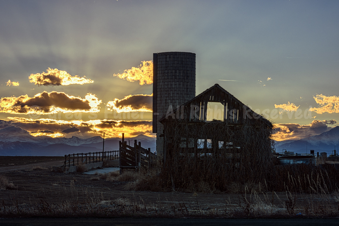 An Abandoned Barn Sunset over the Rockies  - Weld County, Colorado