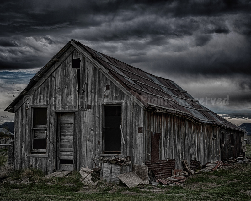 Well worn wood Under Ominous Skies  - Trinchera, Colorado